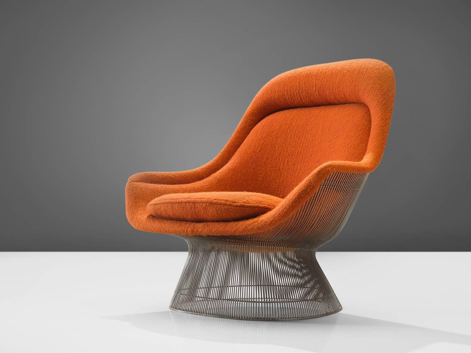 Warren Platner for Knoll, easy chair 'model 1705', nickelled steel and original orange fabric, United States, design 1966, production later

This iconic orange easy chair by Warren Platner is created by welding curved steel rods to circular and