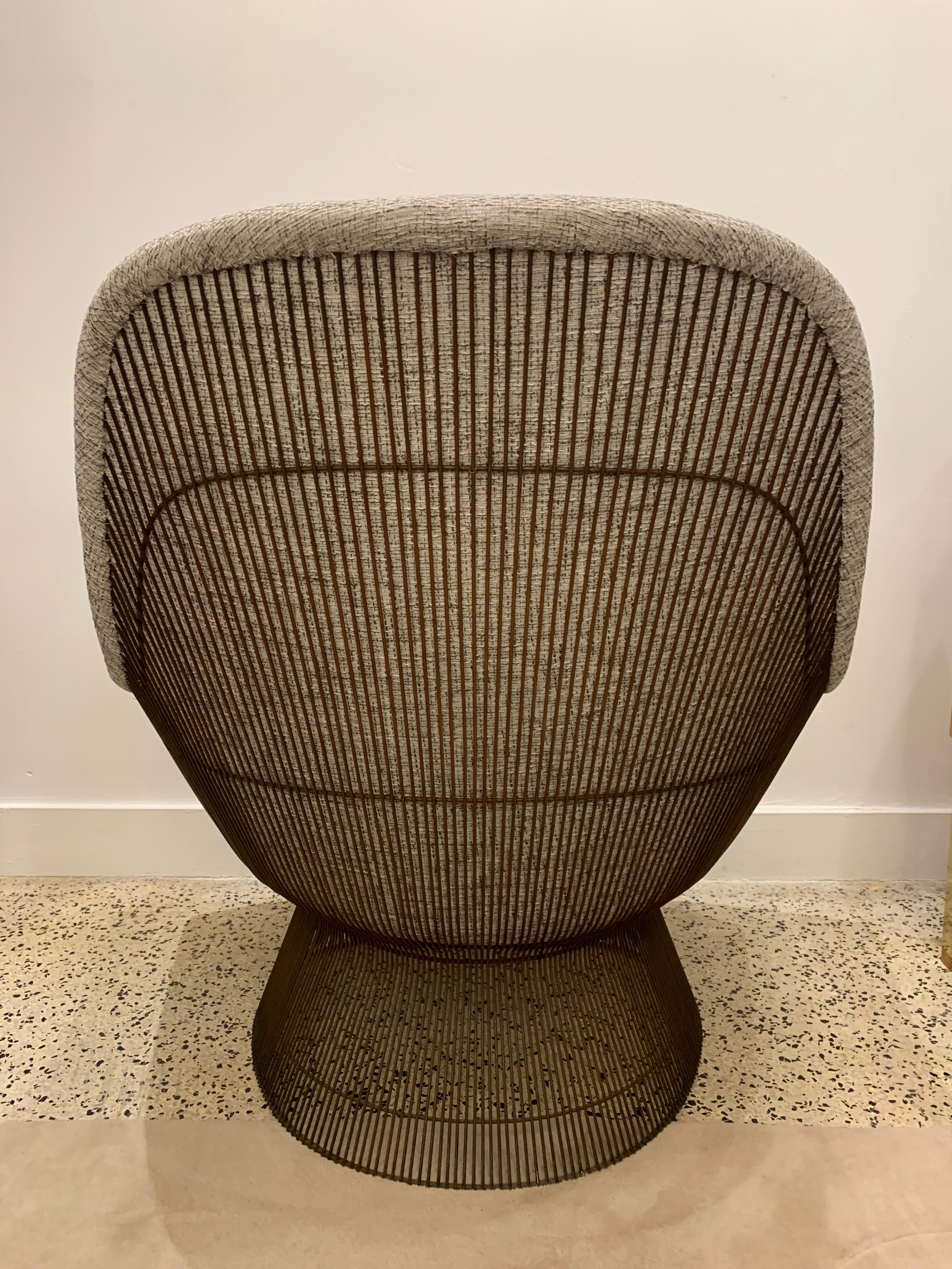 A bronze-steel frame and newly upholstered in this bright tweed wool/cotton blend fabric, this 'model 1705' lounge chair with ottoman by Warren Platner in 1966 for Knoll International. This iconic easy chair by Platner is created by welding curved