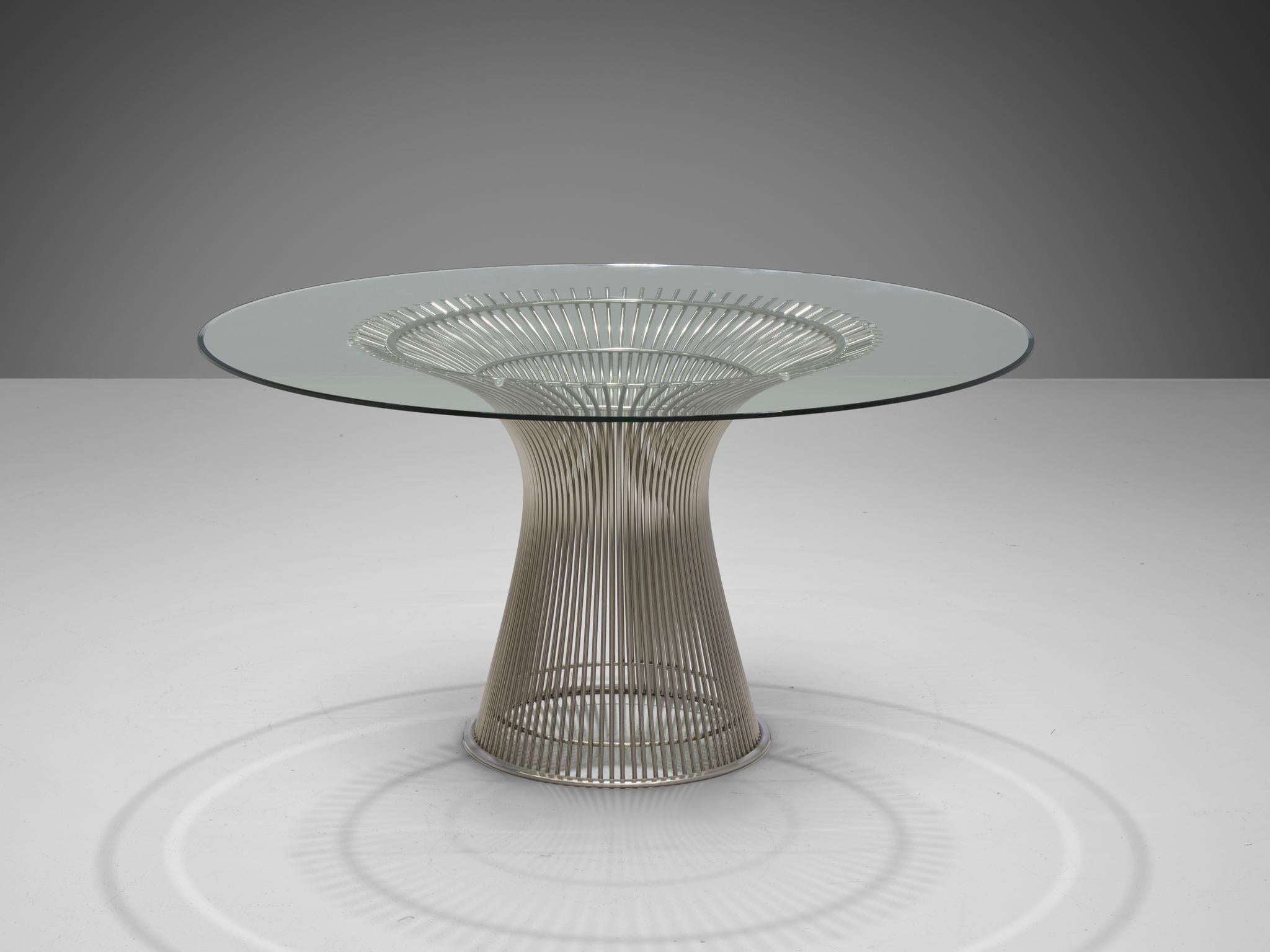 Warren Platner for Knoll, dining table, glass and chrome-plated metal, United States, circa 1966 

This iconic center table by Warren Platner (1919-2006) is created by welding curved steel rods to circular and semi-circular frames, simultaneously