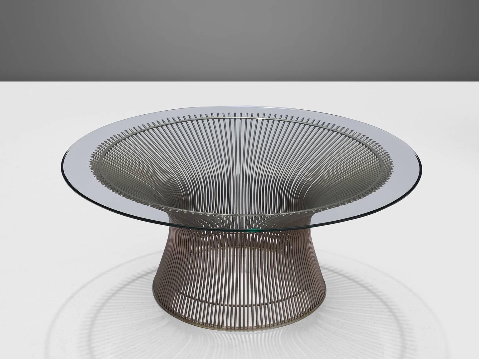 Warren Platner for Knoll, cocktail table, glass and metal, United States, 1966, 1980s production. 

This iconic coffee table by Warren Platner is created by welding curved steel rods to circular and semi-circular frames, simultaneously serving as
