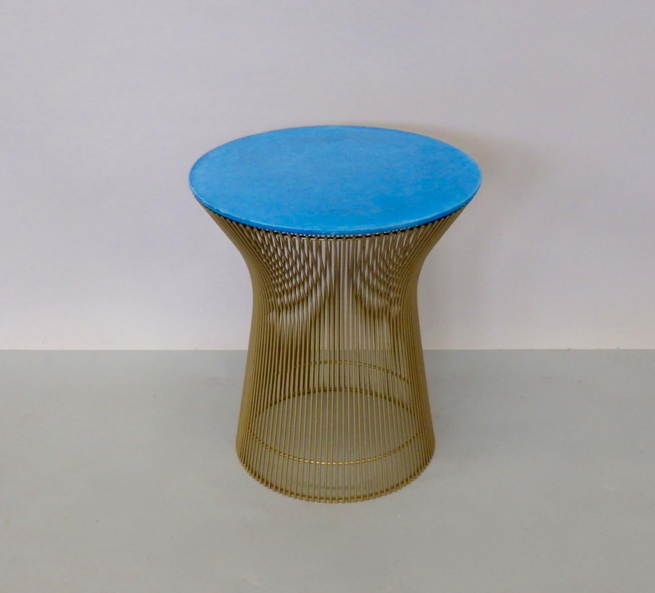 This is a  Knoll wire table base custom finished in gold powdercoat . Cast cement top in blue is also a custom addition. The table was custom tailored by local decorator for a Grosse Pointe Mi. Lake home.
