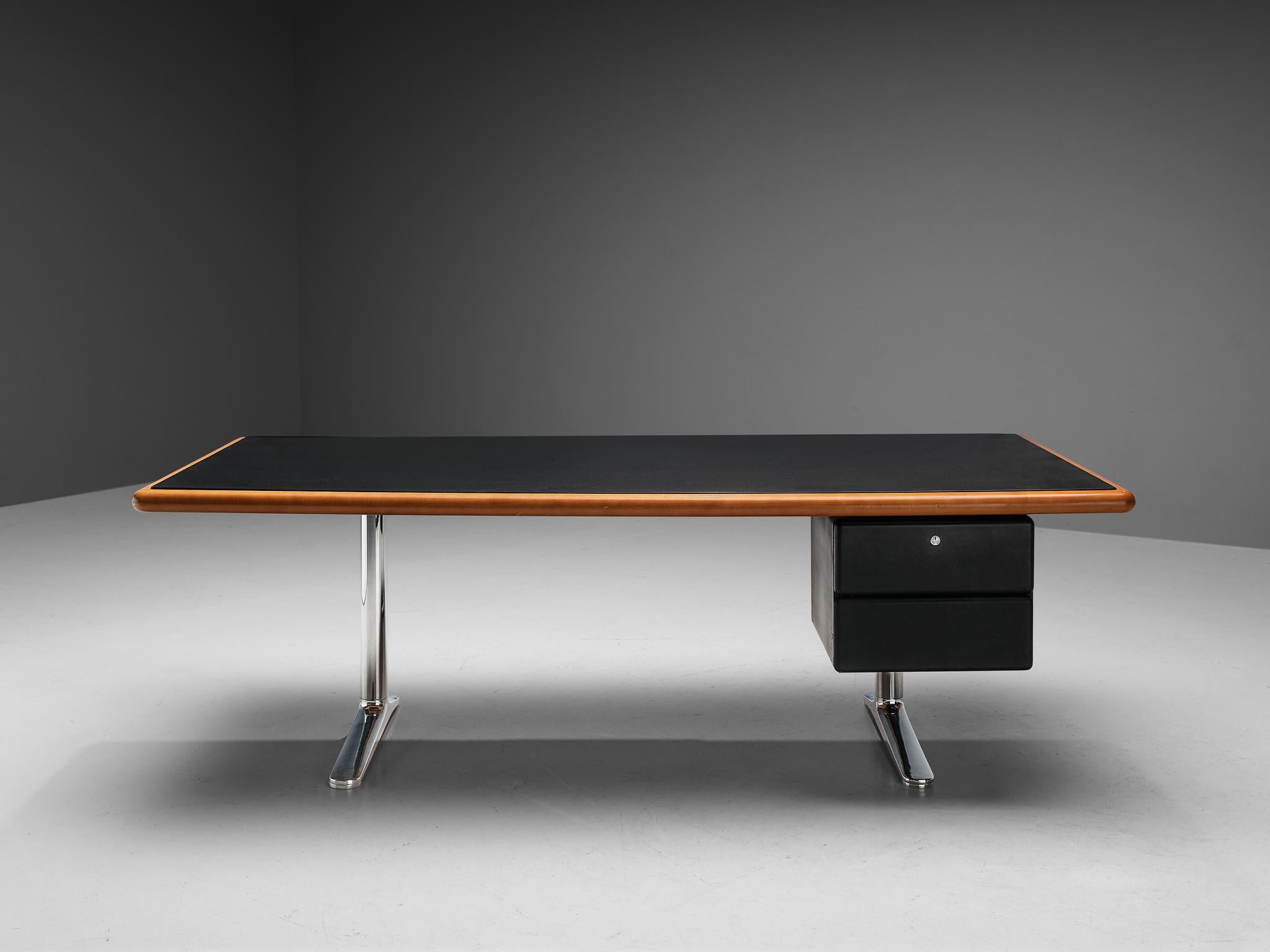 Warren Platner for Knoll, writing desk, cherry, chrome-plated metal, black leather, United States, 1970s. 

This writing table with two drawers and an extendable panel was designed by Warren Platner for Knoll International in the 1970s. The three