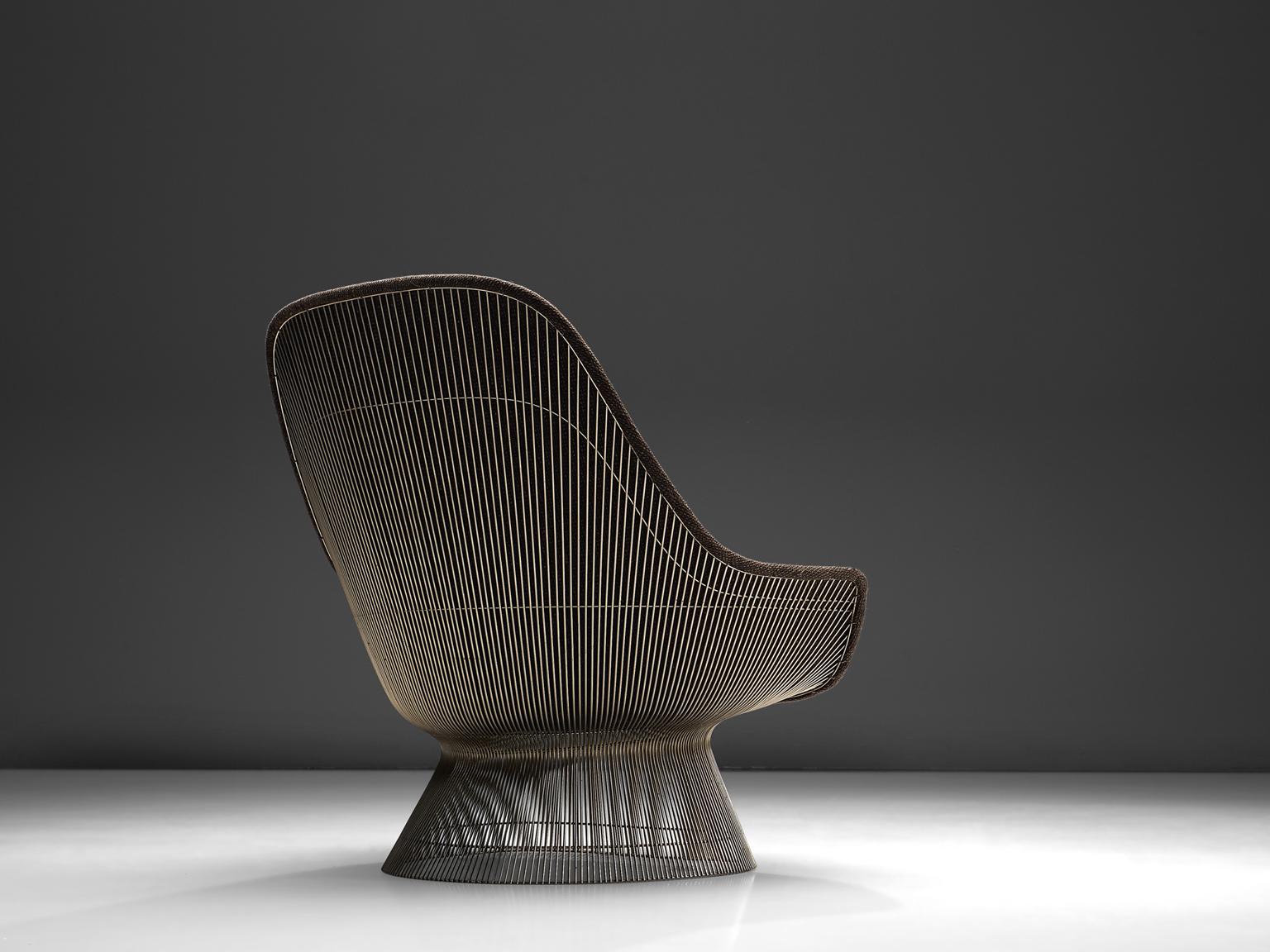 Warren Platner for Knoll, easy chair 'model 1705' and ottoman, steel and brown fabric, United States, design 1966, production later.

This iconic easy chair by Warren Platner is created by welding curved steel rods to circular and semi-circular