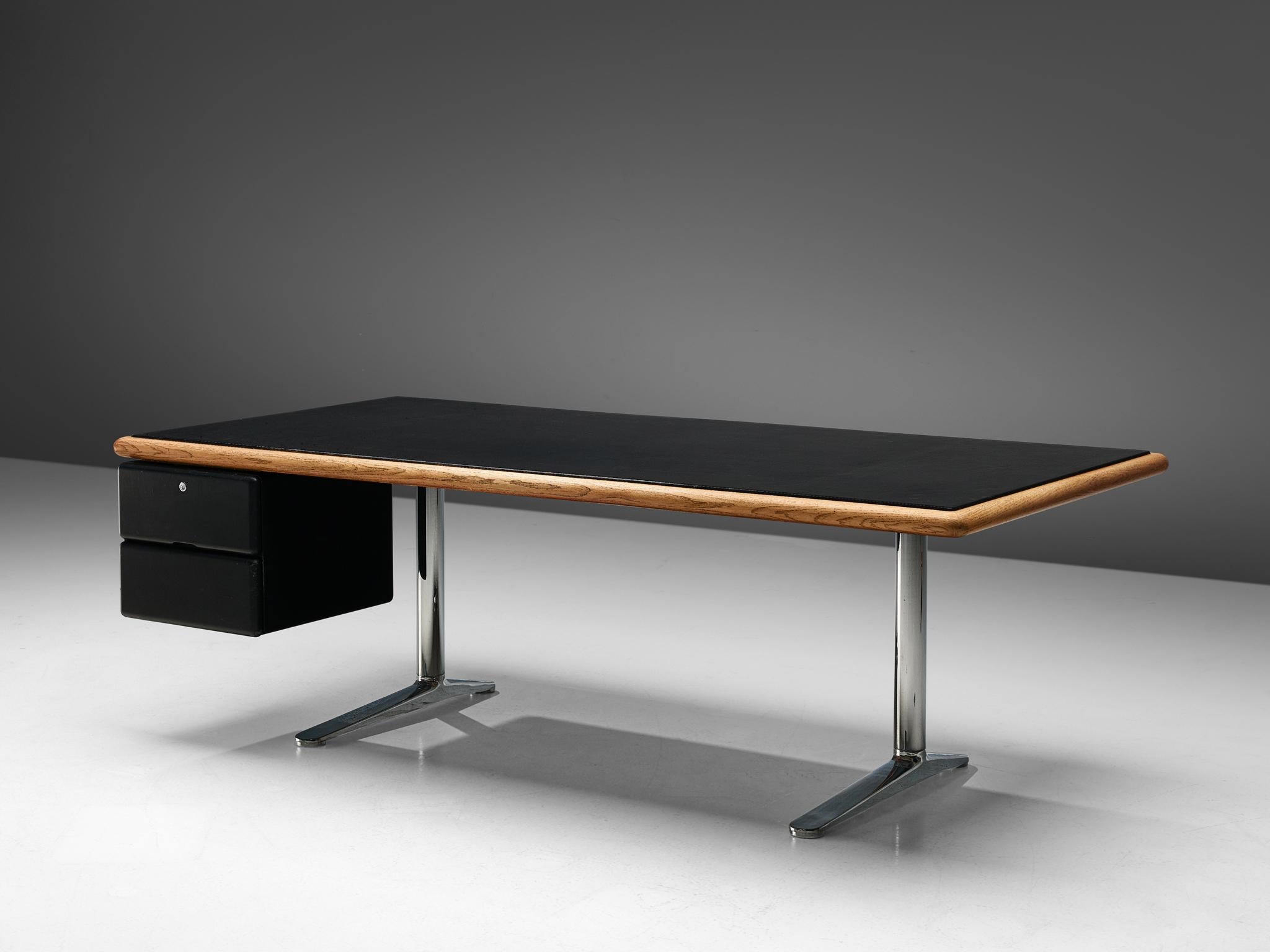 Warren Platner for Knoll, executive desk, leather, steel, oak, metal, United States, 1973.

This heavy, sturdy desk is designed by the American modernist Warren platner. He is most known for his airy metal, sculptural lounge chairs. Perhaps it is