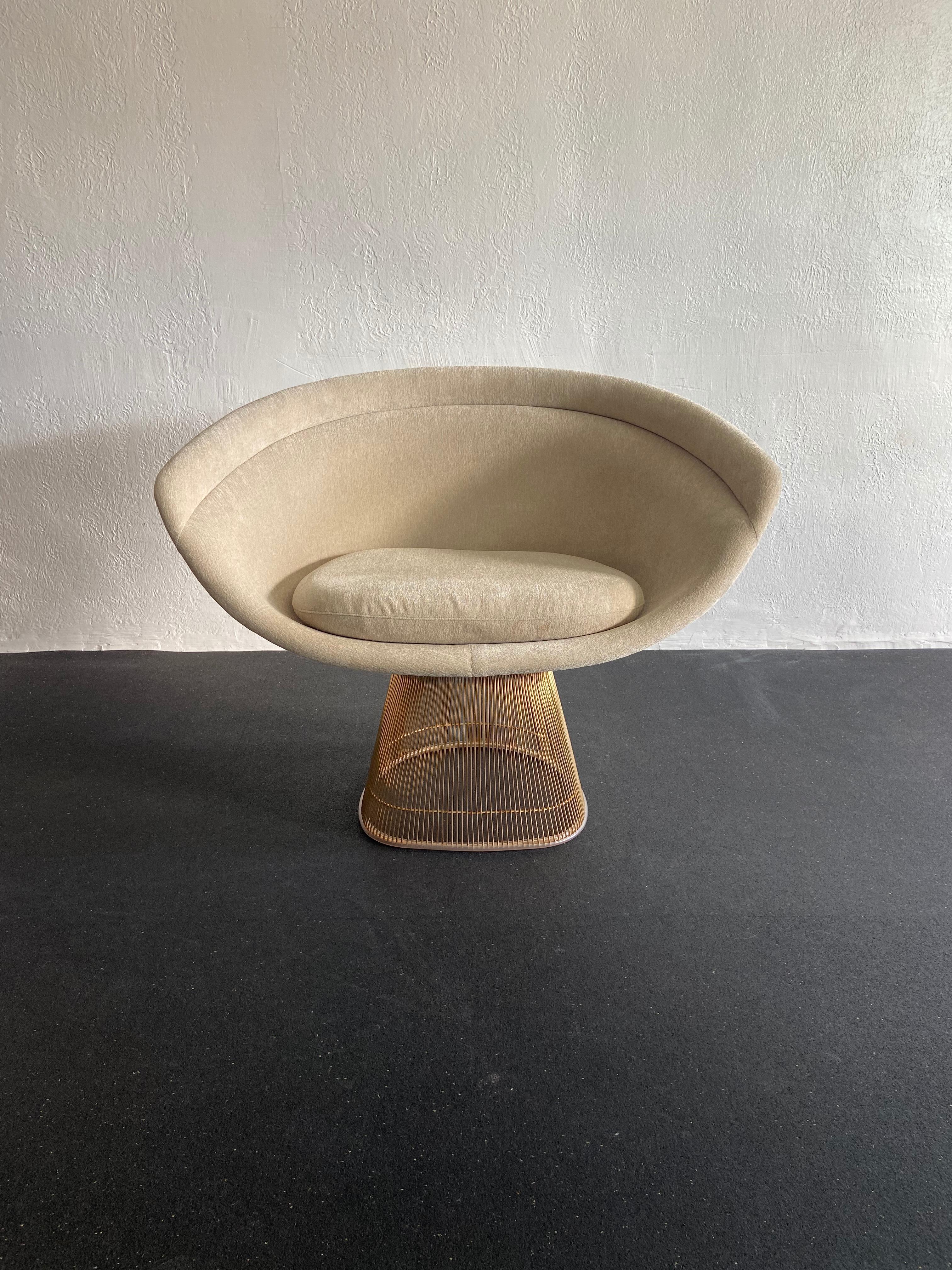 Warren Platner for Knoll gold wire lounge chair. Upholstered in chenille. Newer production. Chairs are in excellent condition with exception of some surface rust found on the wire. No attempts have been made to clean it in fear of disturbing the