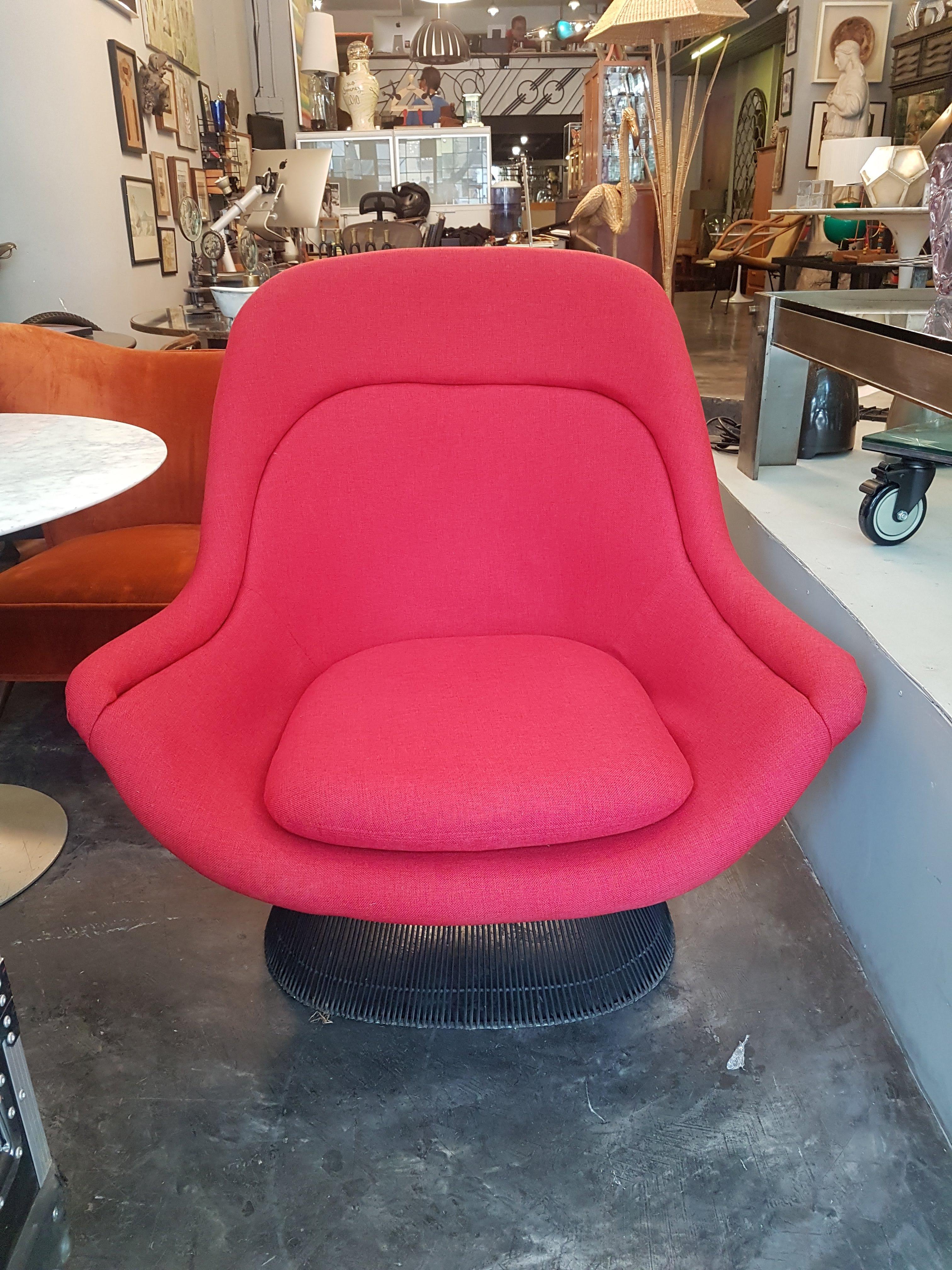 A marvelous lounge chair attributed to American designer Warren Platner. The steel rod structure has recently been reupholstered with red fabric.