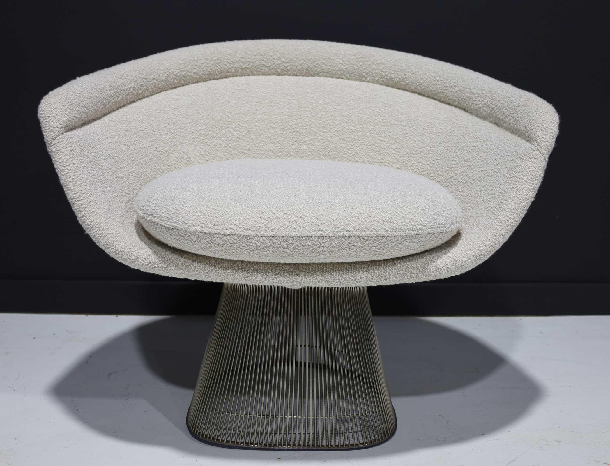 Beautifully reupholstered, a Warren Platner for Knoll nickel lounge chair in a high-quality off-white boucle.