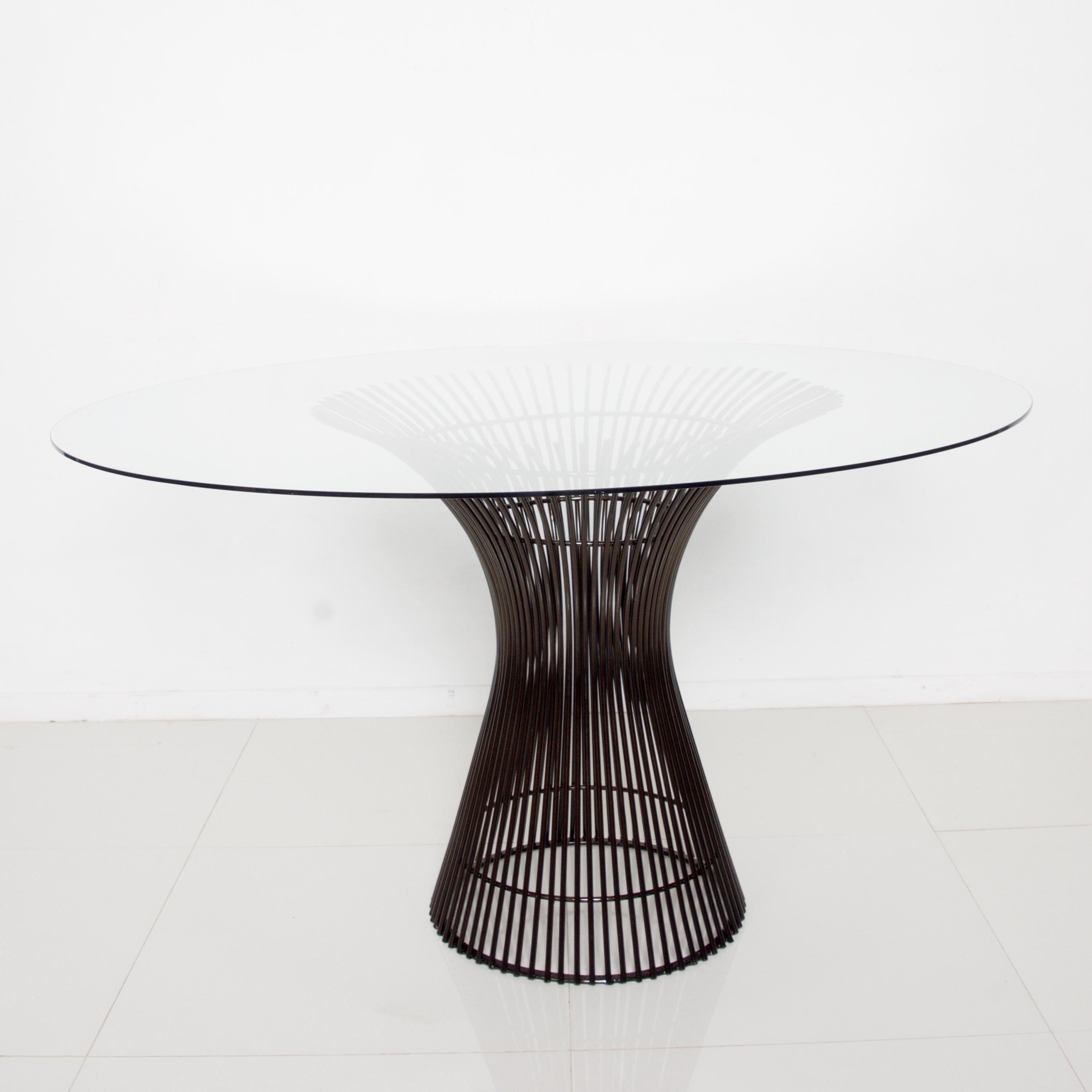 AMBIANIC presents: 
1960s For KNOLL attributed designer Warren Platner graceful & iconic Dining Table in Metallic Bronze
The dining table has a new marble top with a satin finish shows nice round beveled edges. The base has a dark bronze finish.