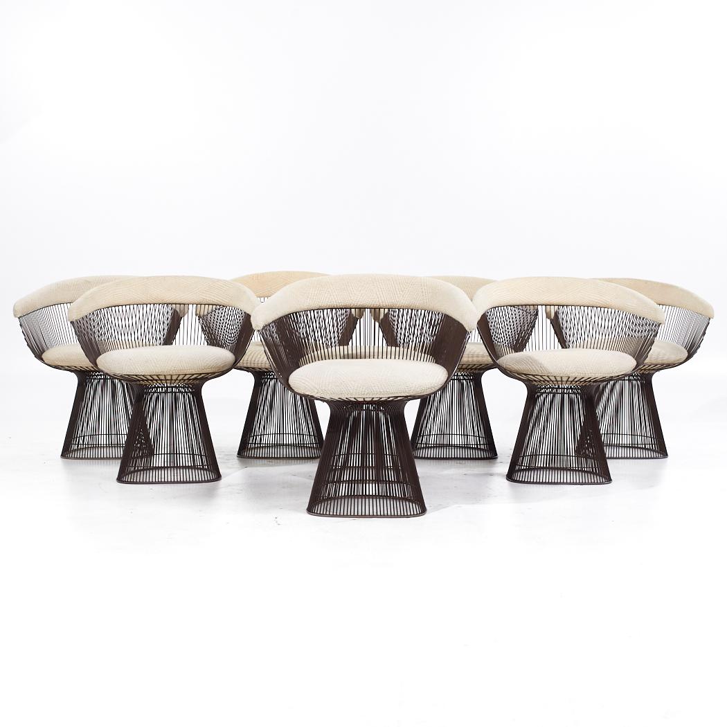 Warren Platner for Knoll Mid Century Bronze Dining Chairs - Set of 8

Each chair measures: 27.25 wide x 22 deep x 29.25 inches high, with a seat height of 18 and arm height/chair clearance of 25 inches

All pieces of furniture can be had in what we