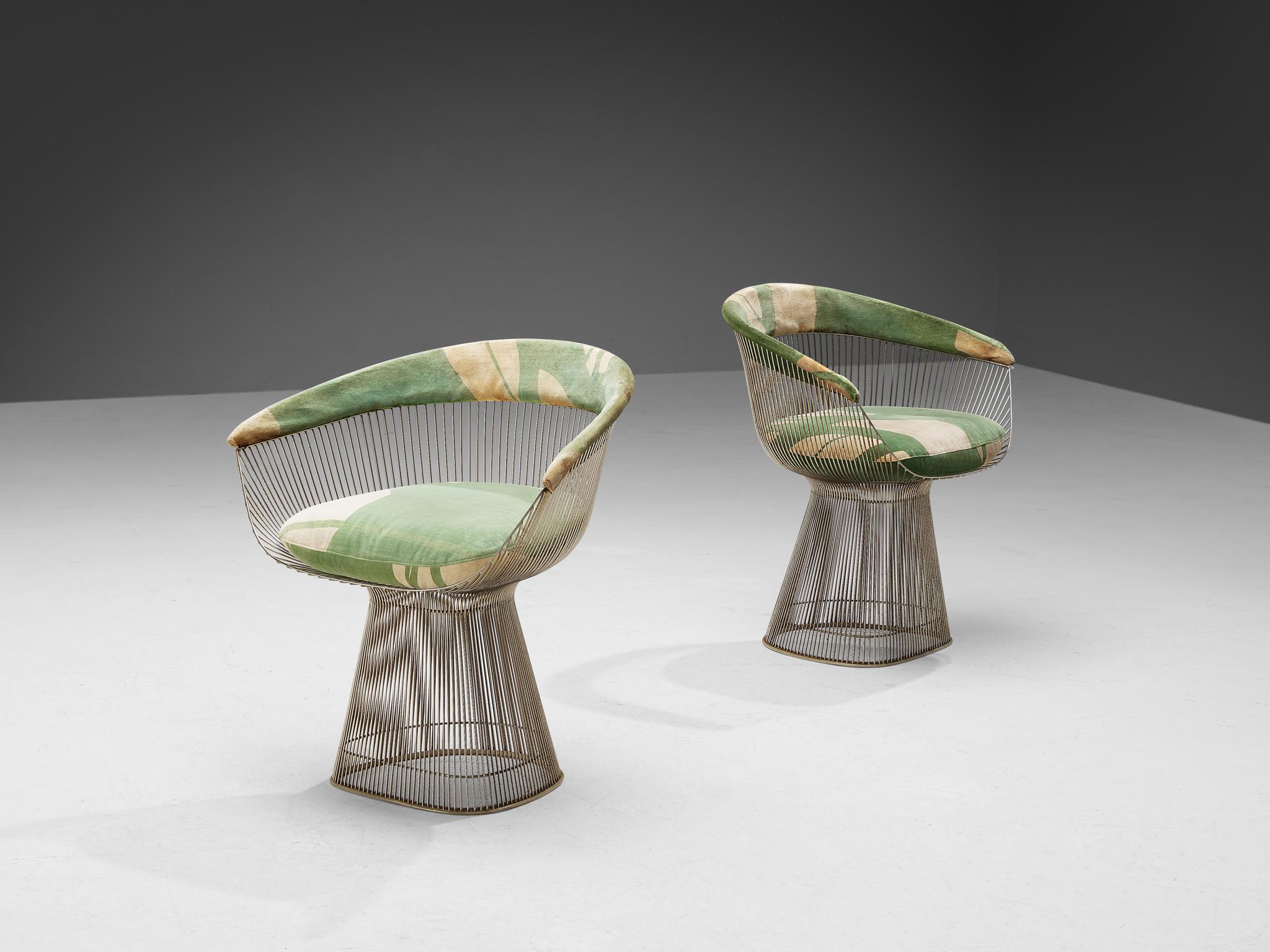 Warren Platner for Knoll, pair of armchairs, metal and yellow-green fabric, United States, 1966.

This iconic pair by Warren Platner (1919-2006) is created by welding curved steel rods to circular and semi-circular frames, simultaneously serving as