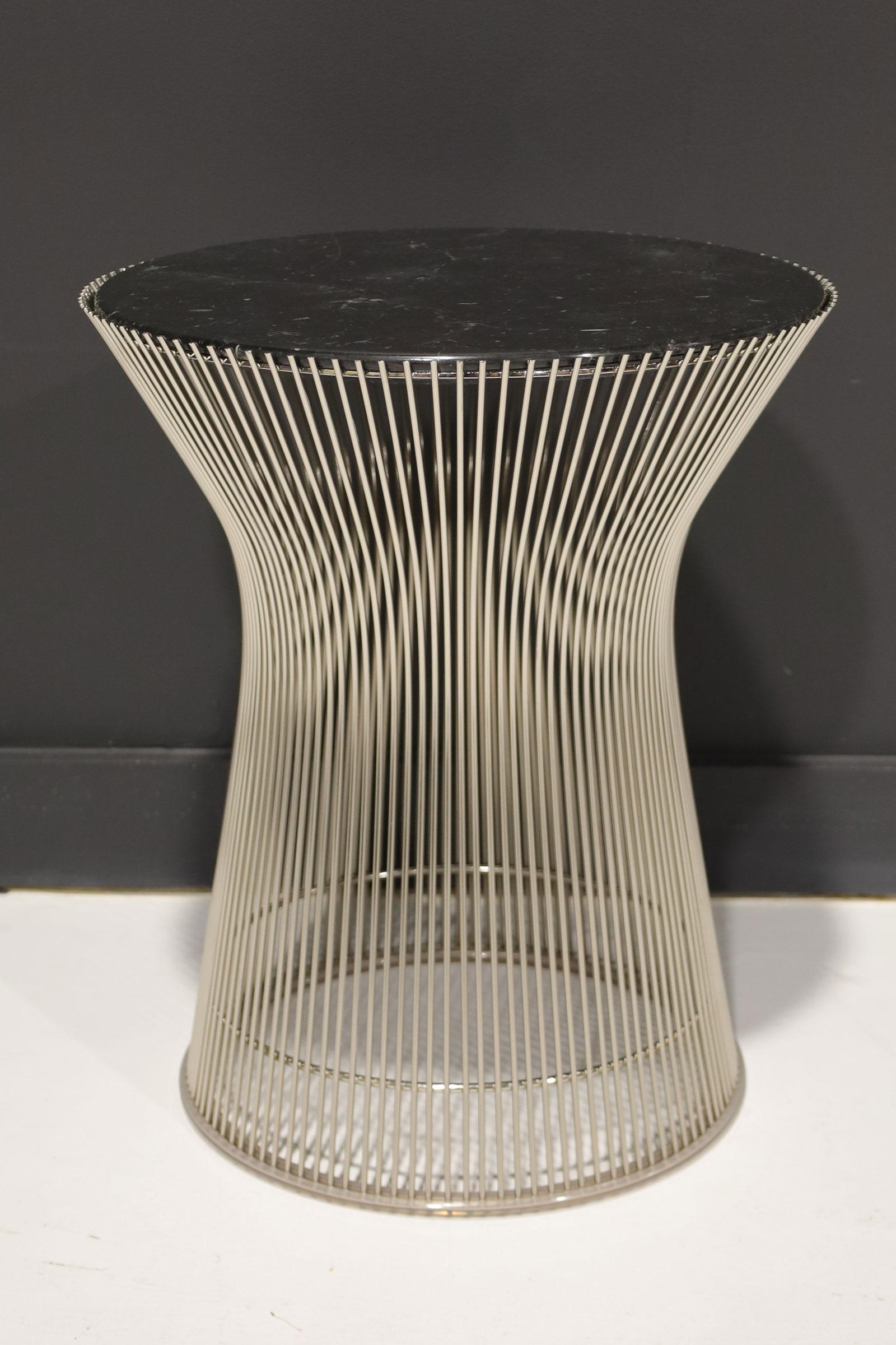 Warren Platner's iconic welded side table with polished nero marquina marble top.
  