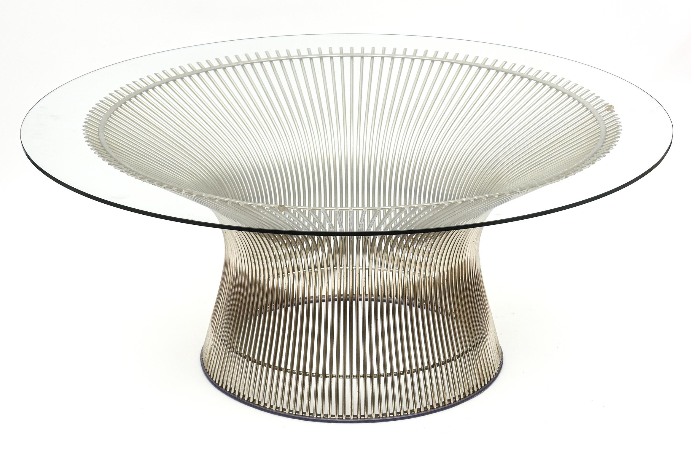 This iconic authentic original Warren Platner chromed wire cocktail table was the original design and production from the 1950's. Knoll was the manufacturer. The original beveled 1/2 thick glass top was chipped so was replace with a 36