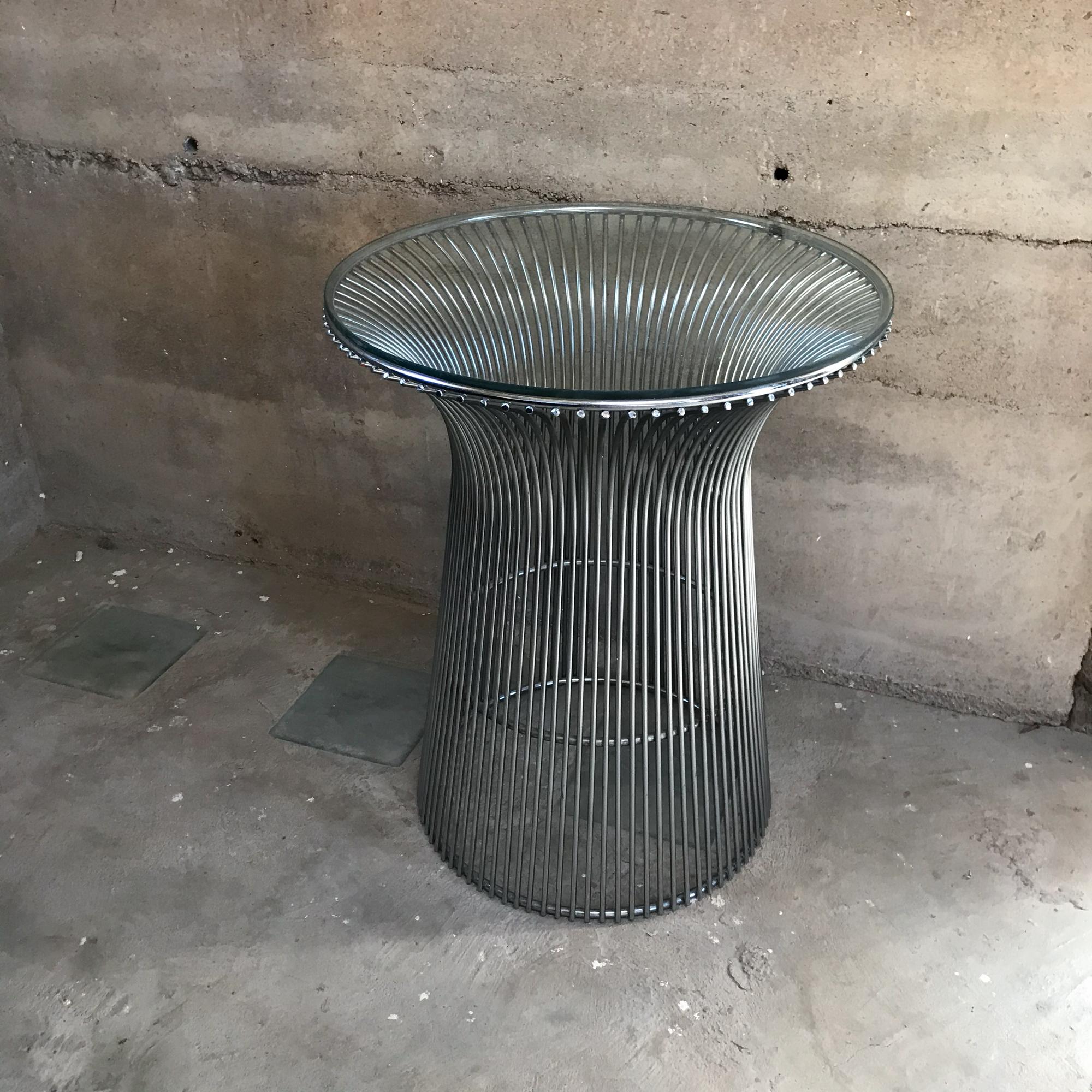 Chrome Side Table
Round Side Table Organic Modern showcasing industrial material in a graceful design.
Style of Warren Platner for Knoll 1970s
Chrome plated steel with original glass top.
Dimensions: 24.25 in H x 20 in diameter.
Original Preowned