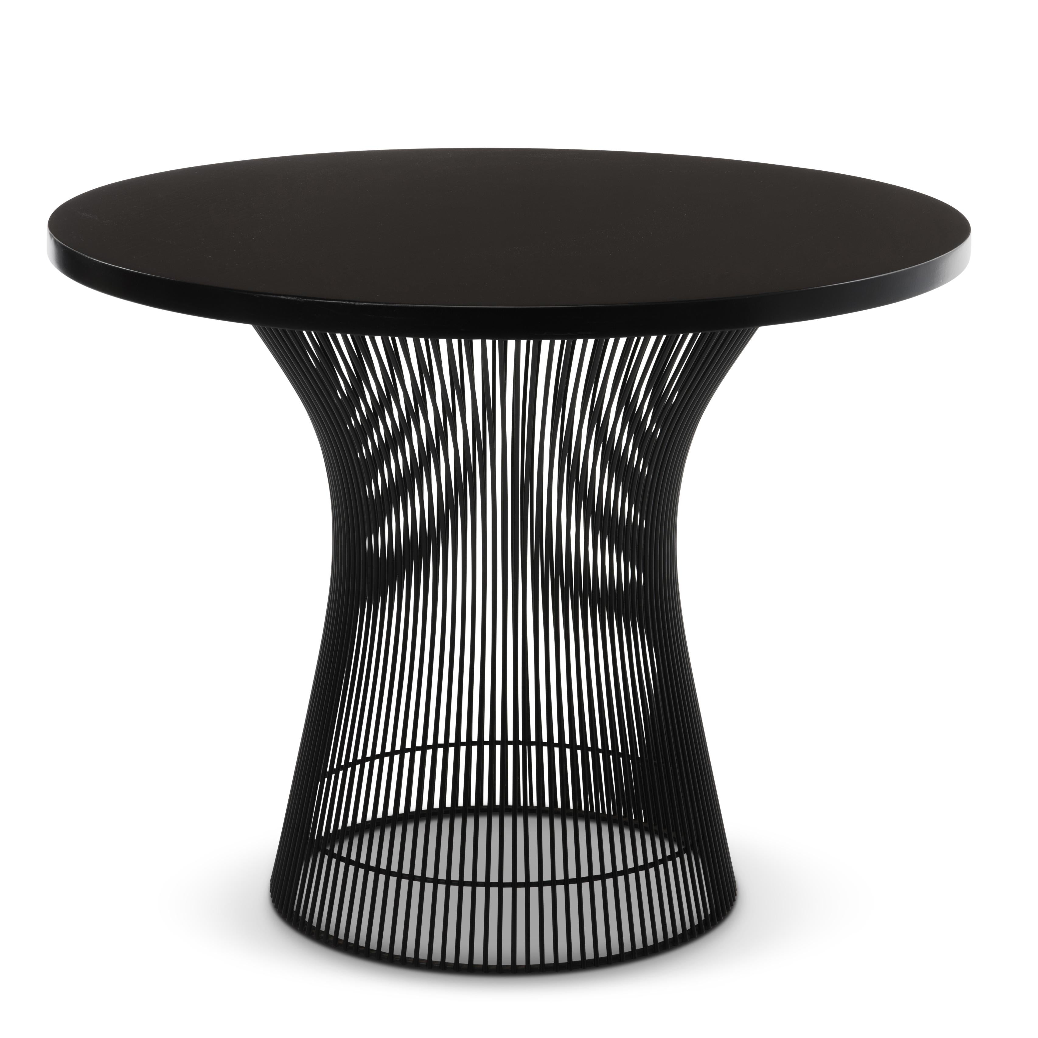 A 1970s ebonized walnut and black base side table designed by Warren Platner for Knoll Associates from the estate of a Knoll employee in East Greenville, PA. This table is unmarked.

The last photograph shows a this table to the right with a