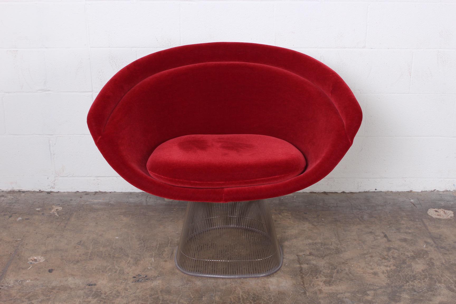 A lounge chair in mohair with nickel frame. Designed by Warren Platner for Knoll.