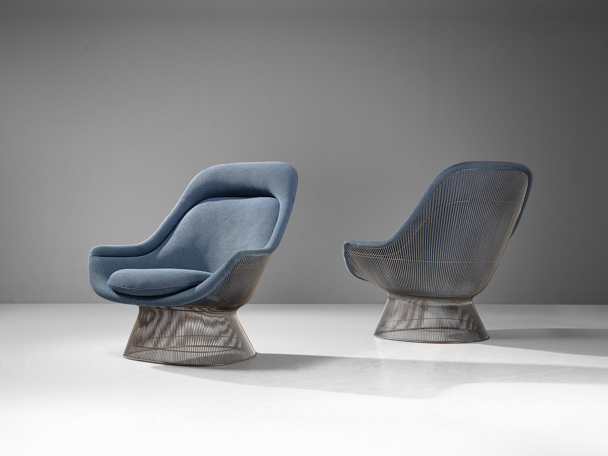 Warren Platner for Knoll, pair of lounge chairs, 'model 1705', nickel-plated steel, fabric, United States, design 1966

This iconic easy chair by Warren Platner is created by welding curved steel rods to circular and semi-circular frames,