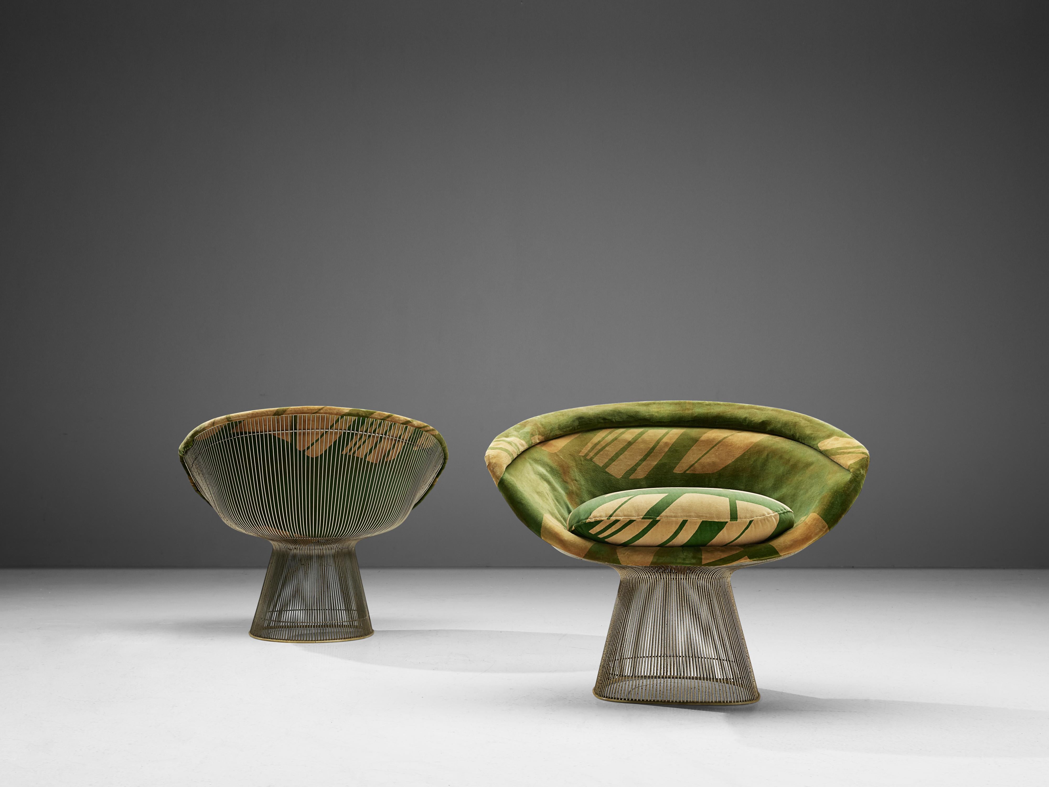 Warren Platner, set of two lounge chairs, metal and yellow-green fabric, United States, 1966. 

This iconic pair by Warren Platner (1919-2006) is created by welding curved steel rods to circular and semi-circular frames, simultaneously serving as