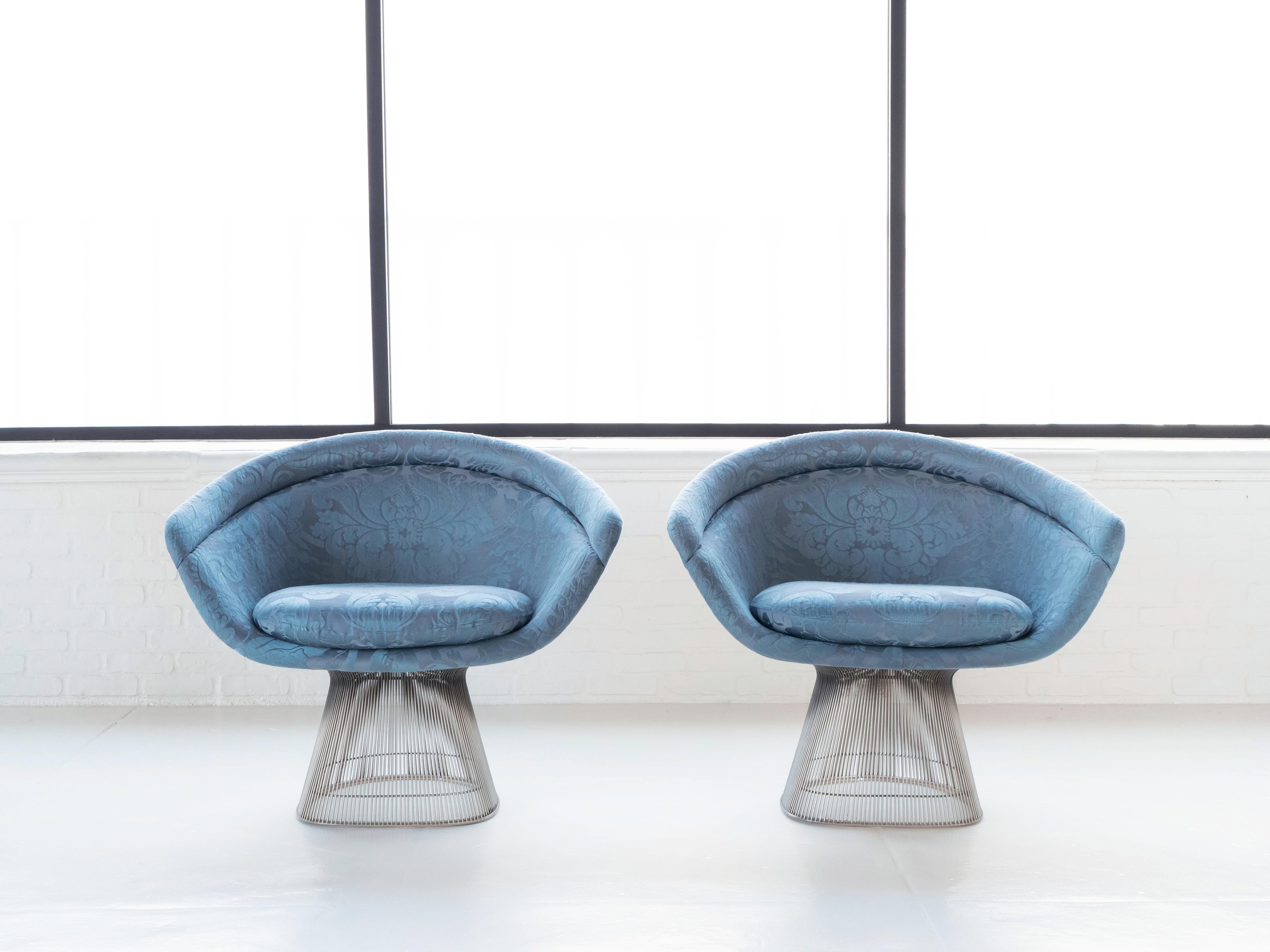 Warren Platner Model No. 1715 Nickel Plated Wire Frame Lounge Chairs designed for Knoll, 1960's/1970's

These iconic chairs have been reupholstered in this blue floral pattern at some point.  The fabric shows light wear and pilling, but no rips or