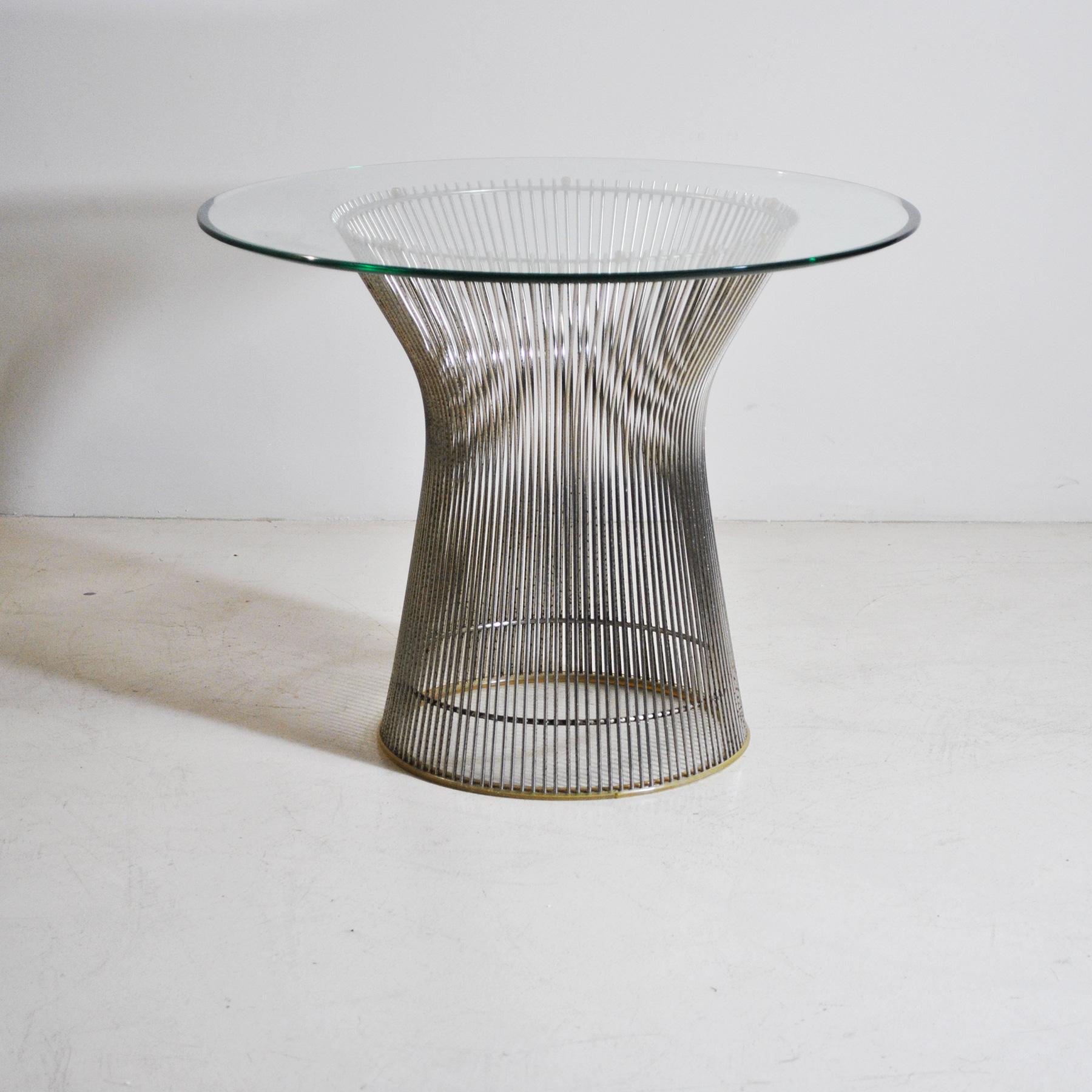 Side table from Knoll's Warren Platner collection in 1962, the coffee table displays Platner's industrial materials well married with graceful organic design. The table is built with ground glass top and chromed base.