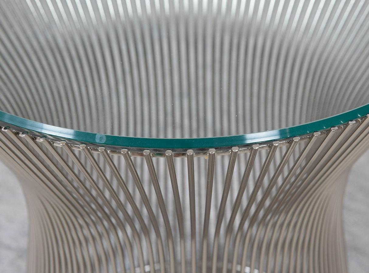 Warren Platner side table. The table has a glass top with a nickeled steel frame.