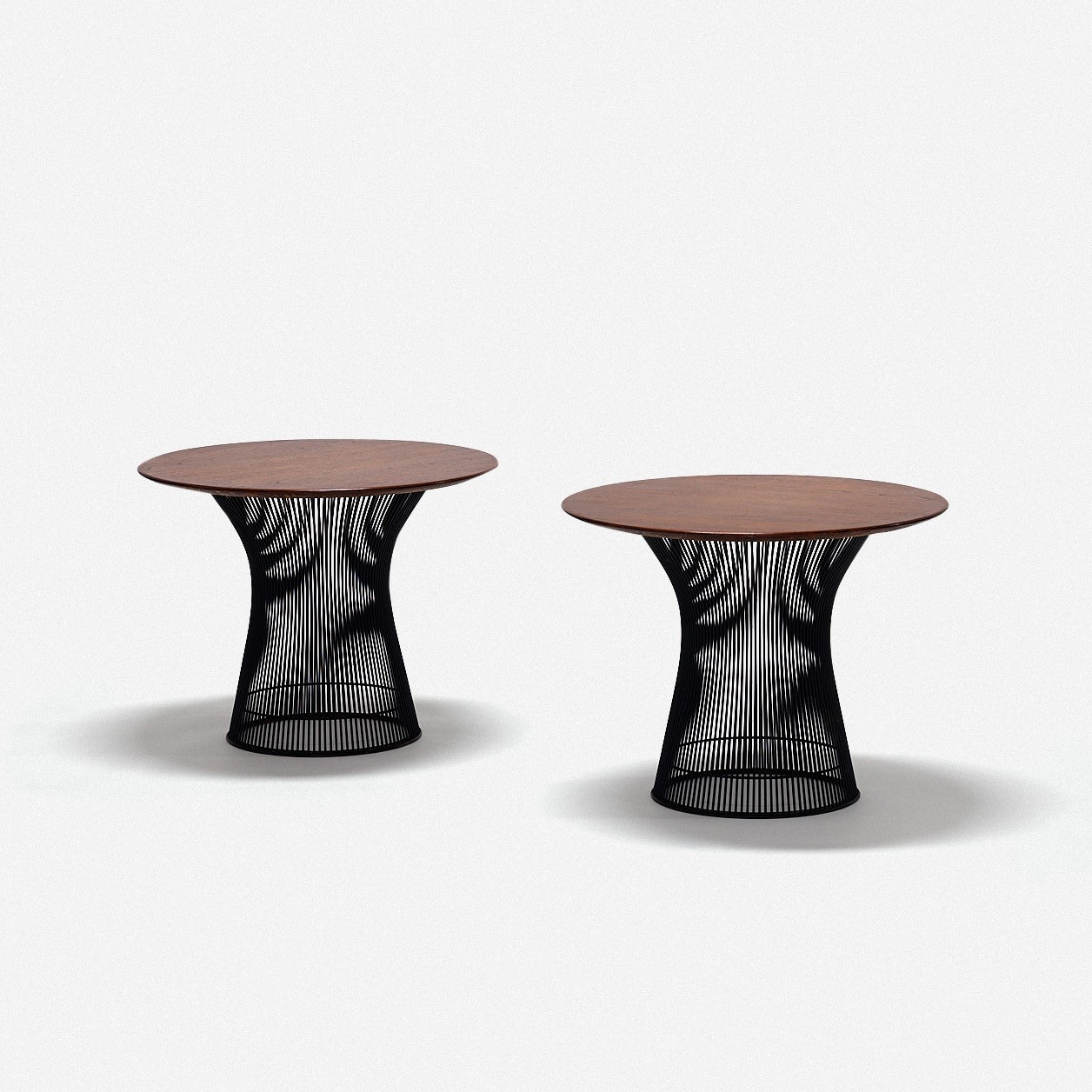 Warren platner
pair of side or occasional tables
Knoll International
USA, 1960s
Oak, bronzed steel
Measures: 18.5 height × 24 diameter inches.