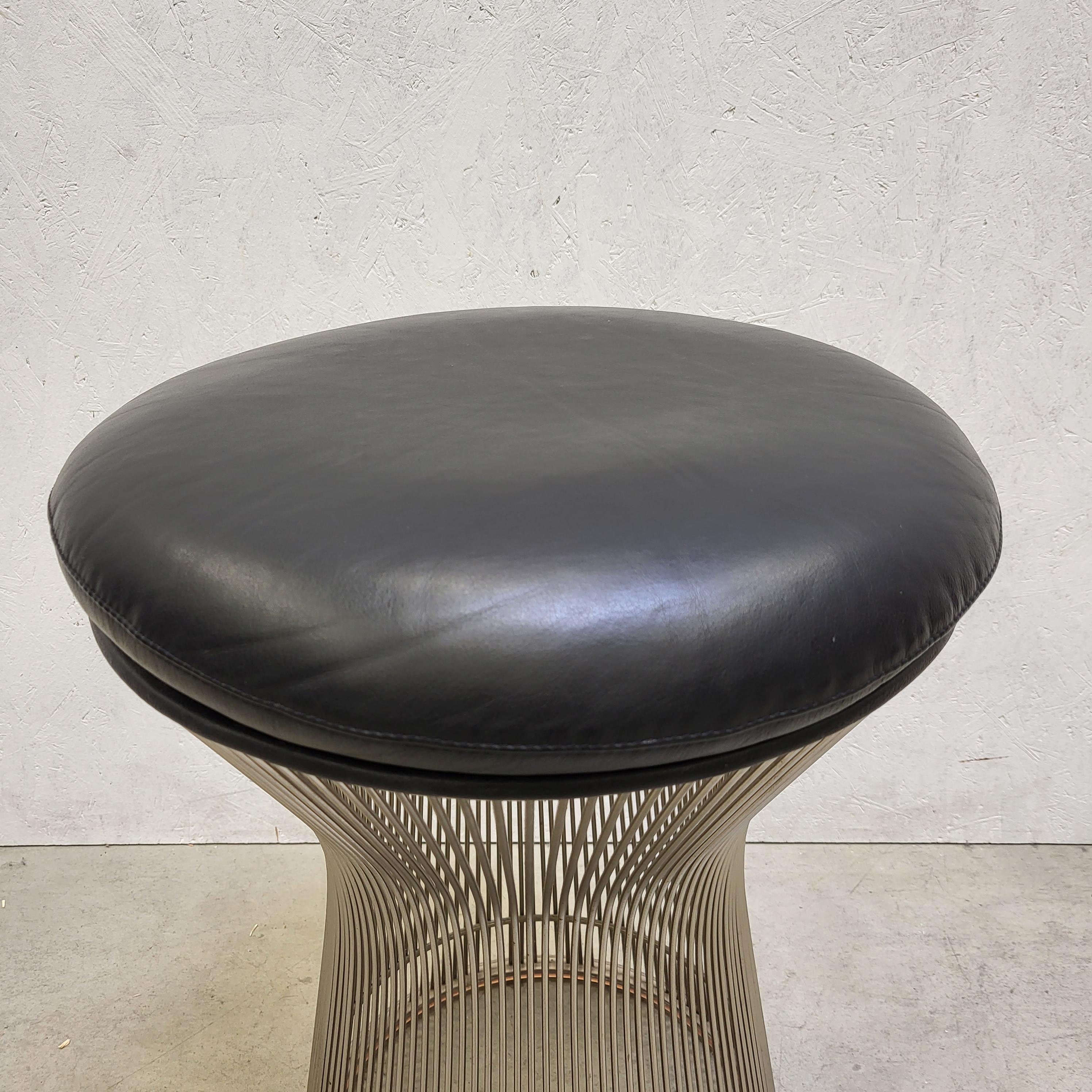 Black leather stool by Warren Platner for Knoll. 

The groundbreaking stool was designed in 1966 by Warren Platner and produced by Knoll after the 2010s.
This mid-century classic supports countless positions and offers a comforting oasis of