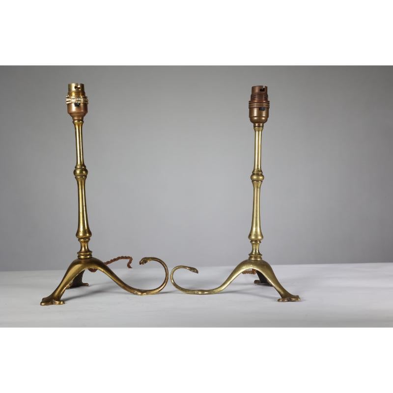 Arts and Crafts WAS Benson. A pair of Arts & Crafts brass table lamps with a serpent style tails For Sale