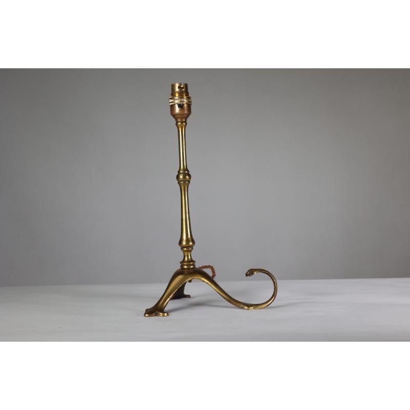 English WAS Benson. A pair of Arts & Crafts brass table lamps with a serpent style tails For Sale