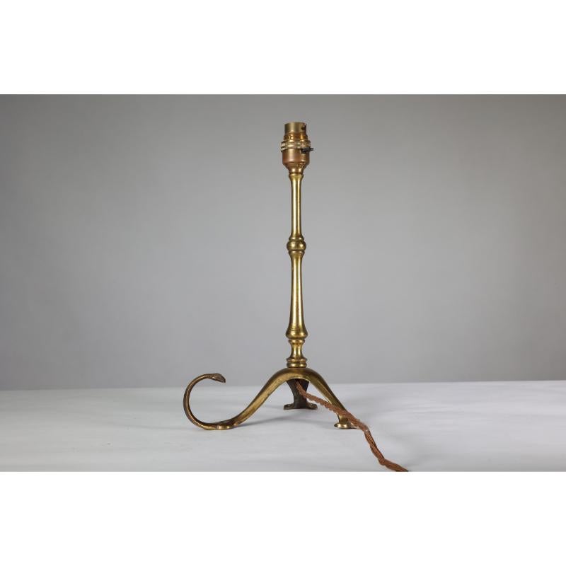 Brass WAS Benson. A pair of Arts & Crafts brass table lamps with a serpent style tails For Sale