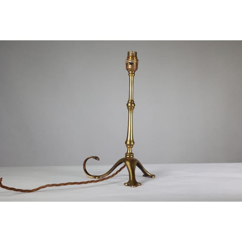 WAS Benson. A pair of Arts & Crafts brass table lamps with a serpent style tails For Sale 1