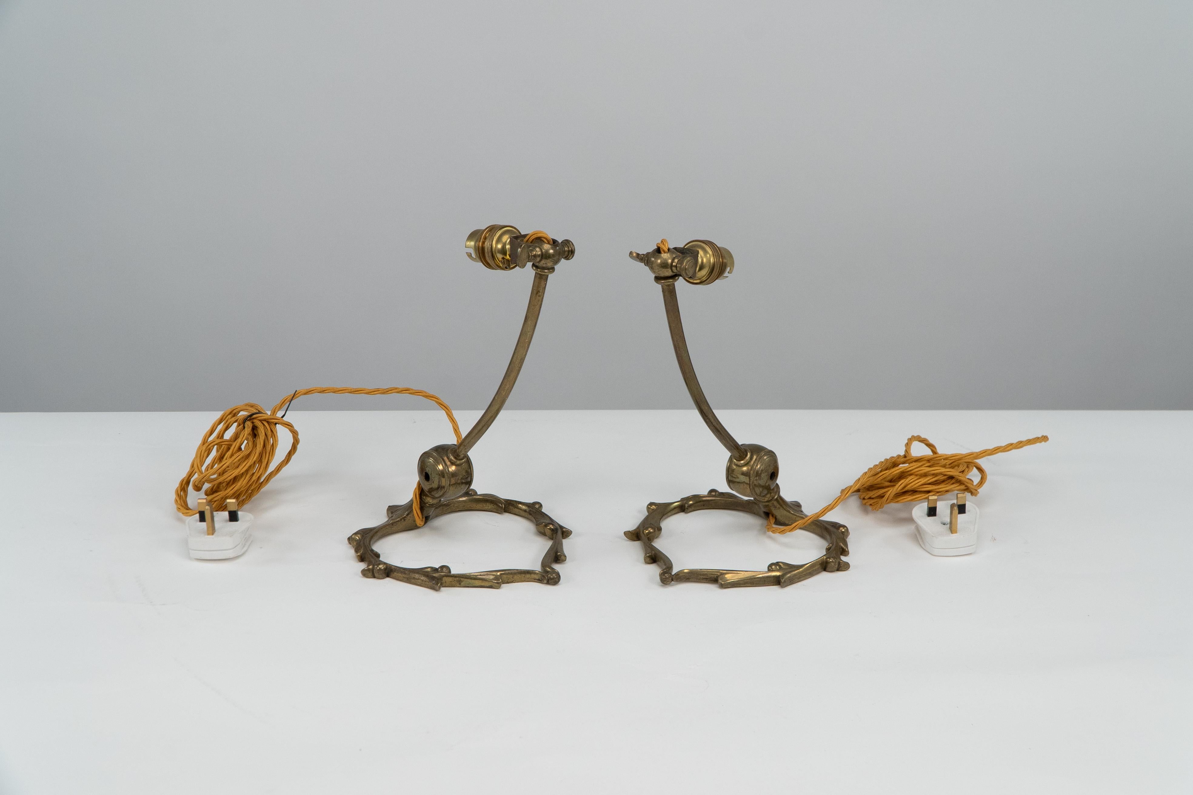 Early 20th Century WAS Benson. A pair of Arts and Crafts brass adjustable Mistletoe table lamps. For Sale