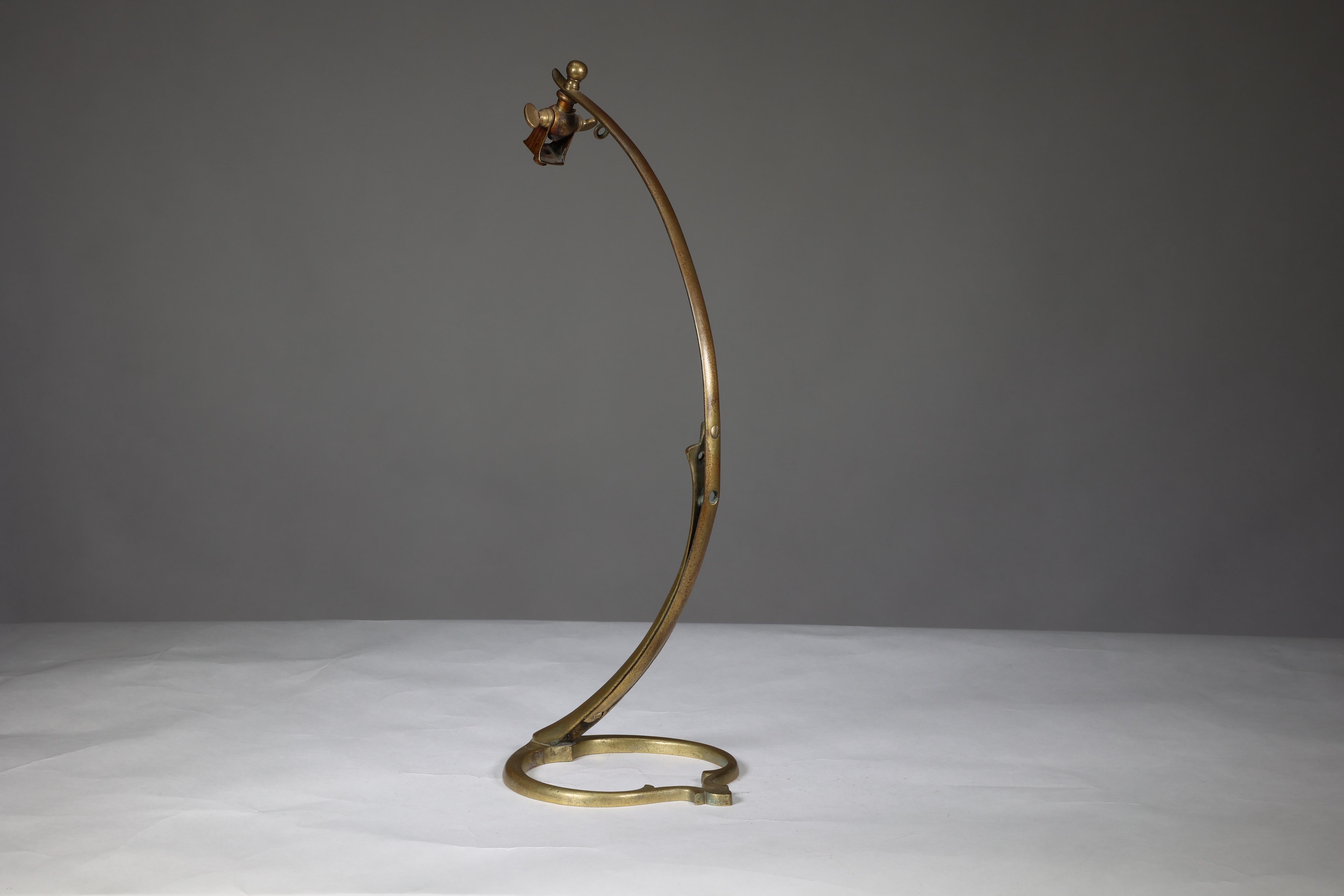 Brass WAS Benson. A near pair of Arts and Crafts brass swan style table lamps.