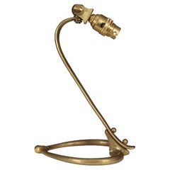 Antique WAS Benson. An Arts and Crafts brass table lamp with heart shaped base