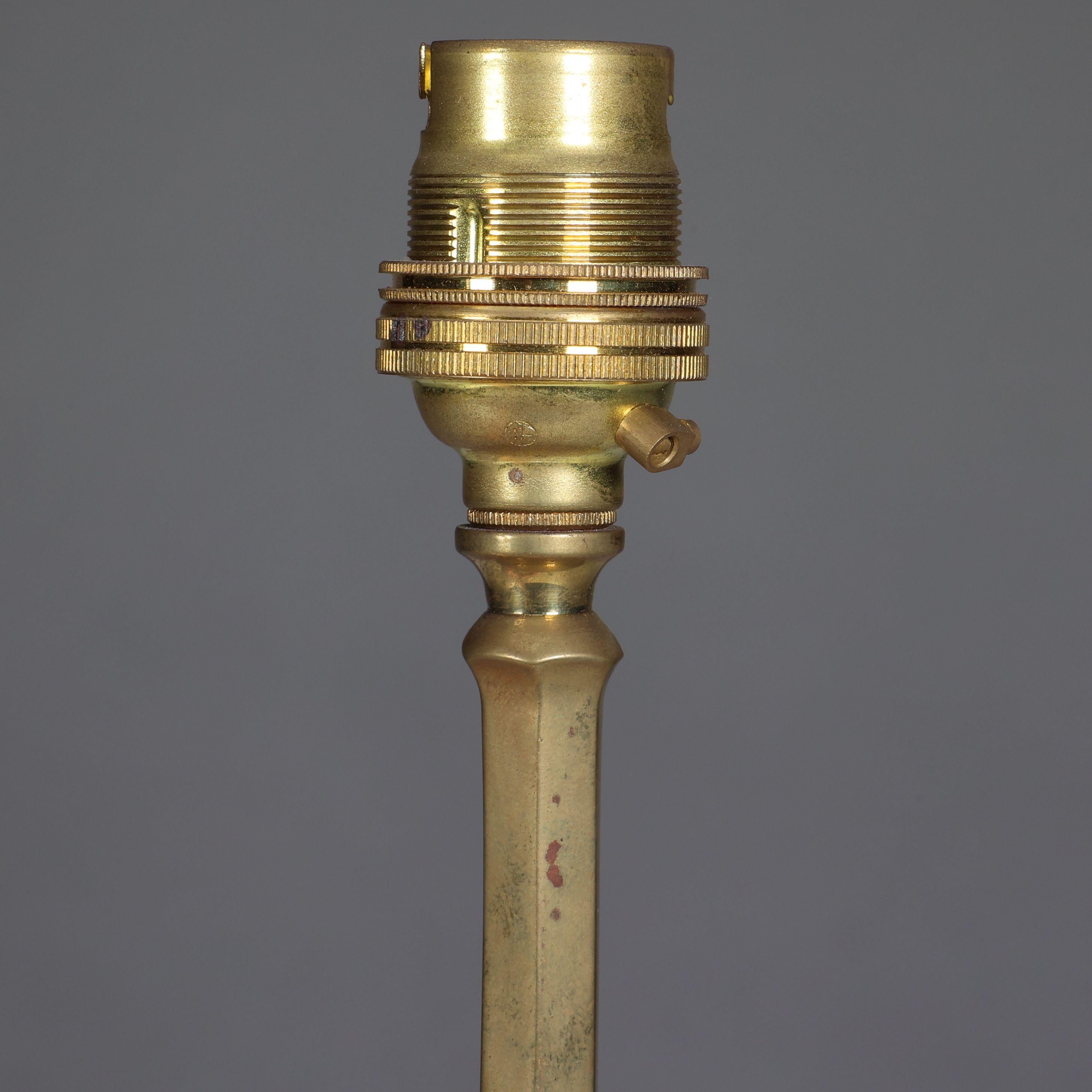 WAS Benson. An Arts and Crafts brass three leg table lamp For Sale 1