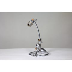 W A S Benson. An Arts and Crafts chrome plated table lamp with heart shaped base