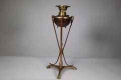 WAS Benson. An Arts and Crafts copper and brass oil lamp.