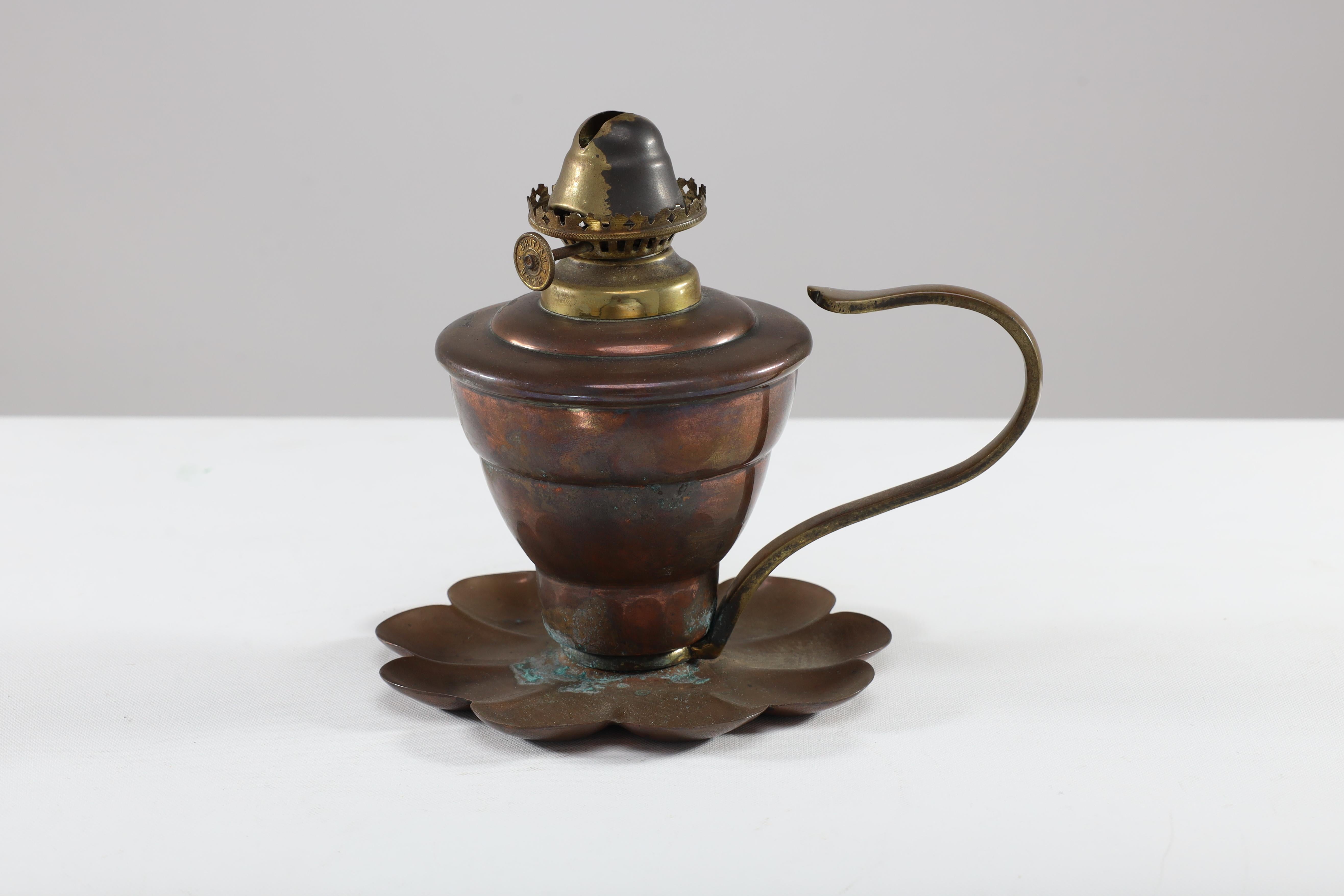 Early 20th Century WAS Benson. An Arts and Crafts copper lilly pad oil light. For Sale