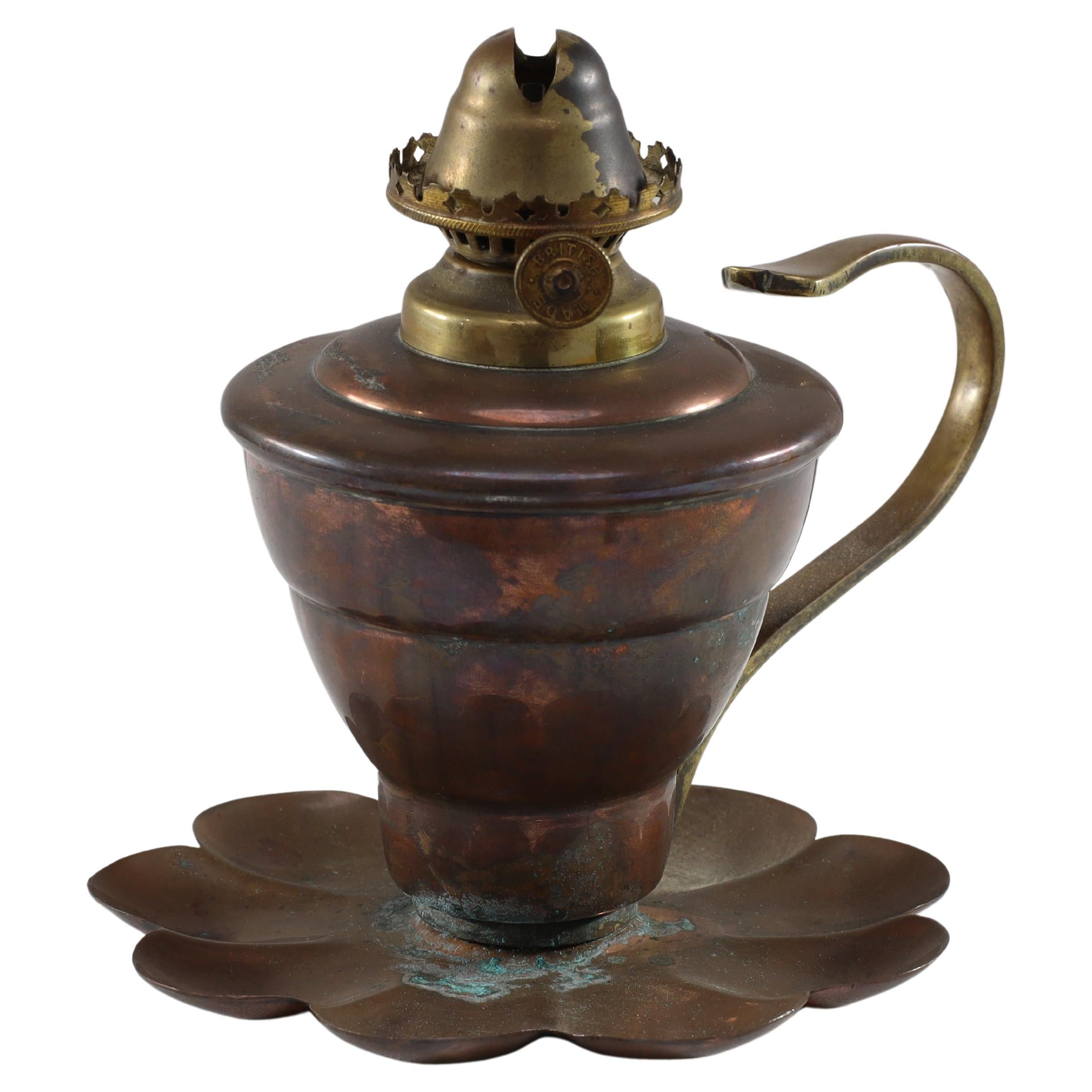 WAS Benson. An Arts and Crafts copper lilly pad oil light.