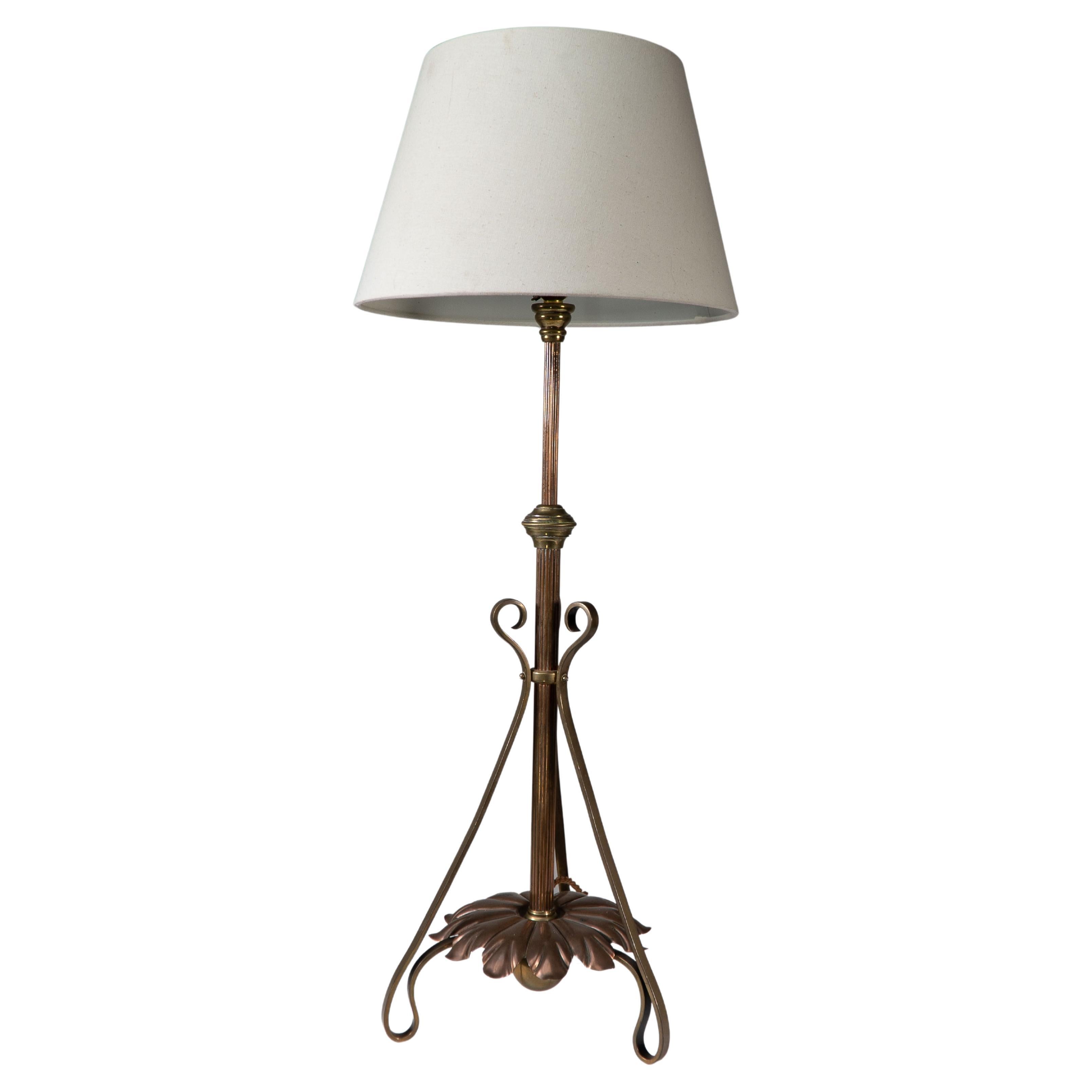 WAS Benson. An Arts and Crafts telescopic adjustable copper and brass table lamp