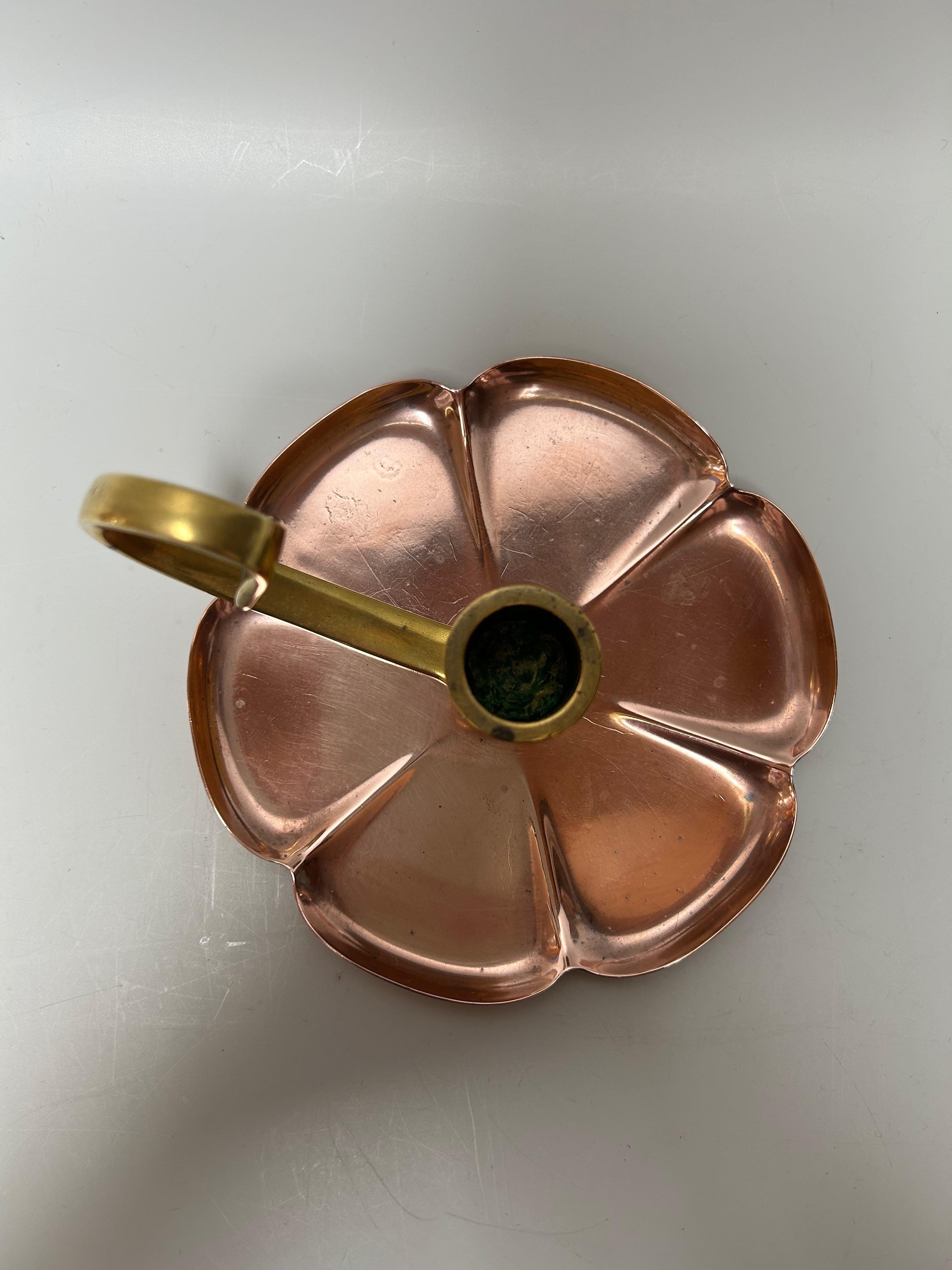 Art Nouveau candle holder circa 1900 in bronze and red copper.

In very good shape

Height: 8.5cm
Diameter: 14.5cm
Weight: 300g

William Arthur Smith Benson (17 October 1854 – 5 July 1924) was a British designer active in the Arts and Crafts