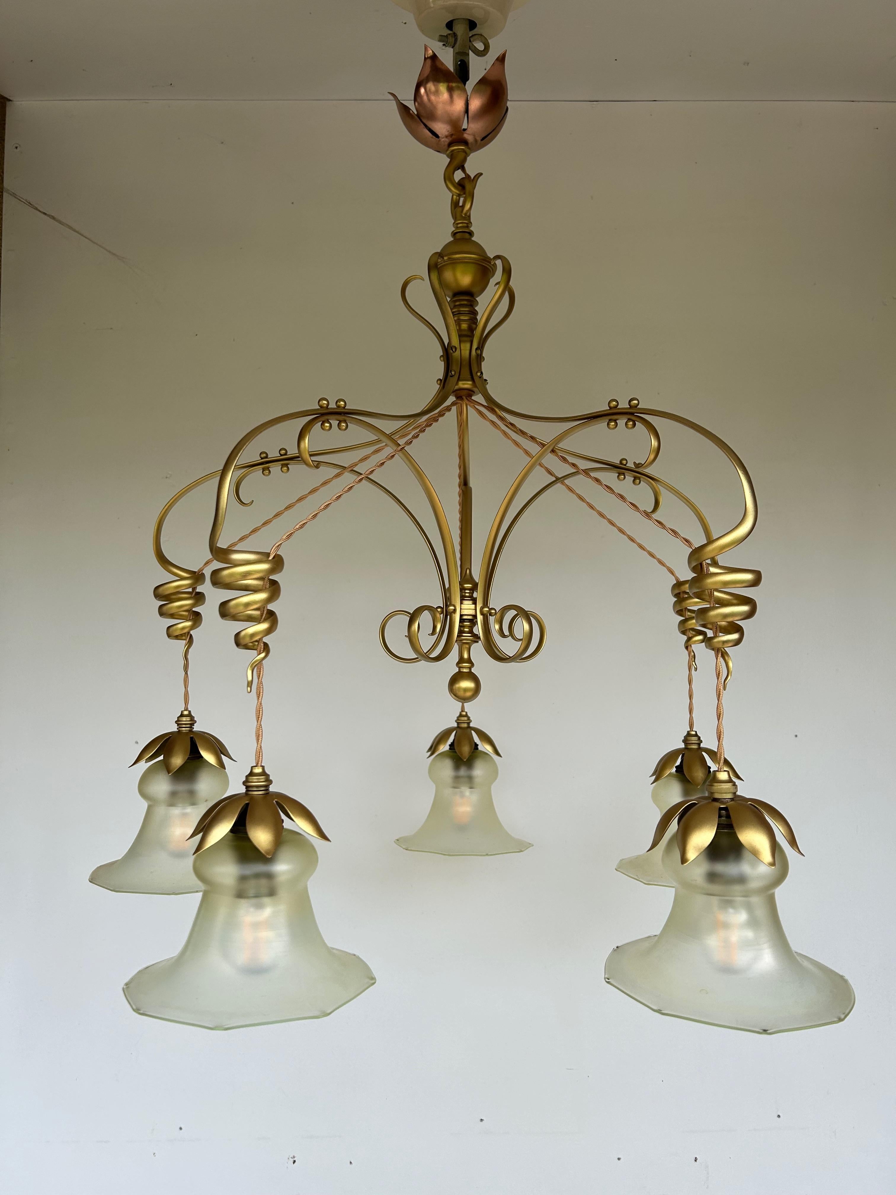 Art nouveau chandelier circa 1900.
Brass and copper frame with 5 branches.
5 opalescent glass tulips by James Powel.
Stamped 2 times 