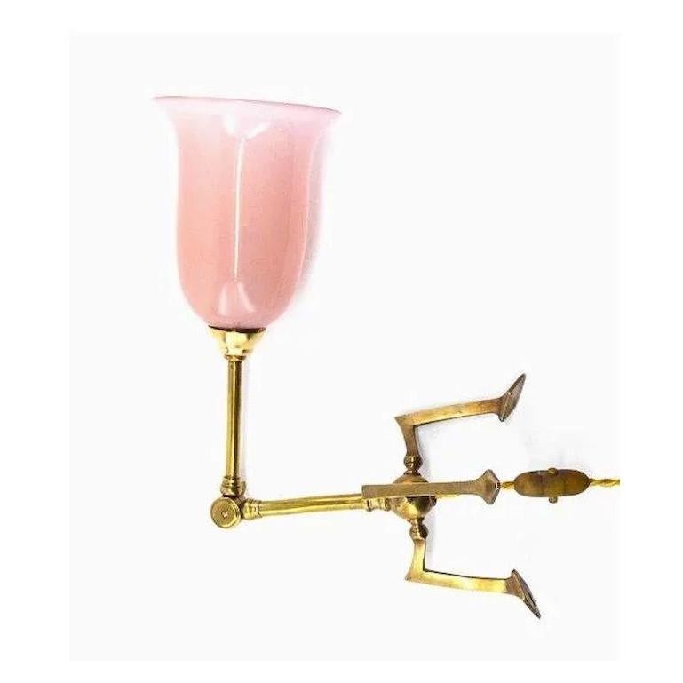 Antique table lamp / wall sconce in the taste of William Arthur Smith Benson, England, circa 1900. Glass and brass. Very Fine shade in opaline pink glass. Articulated brass fixture. Can be used as table lamp or wall sconce double hole with two