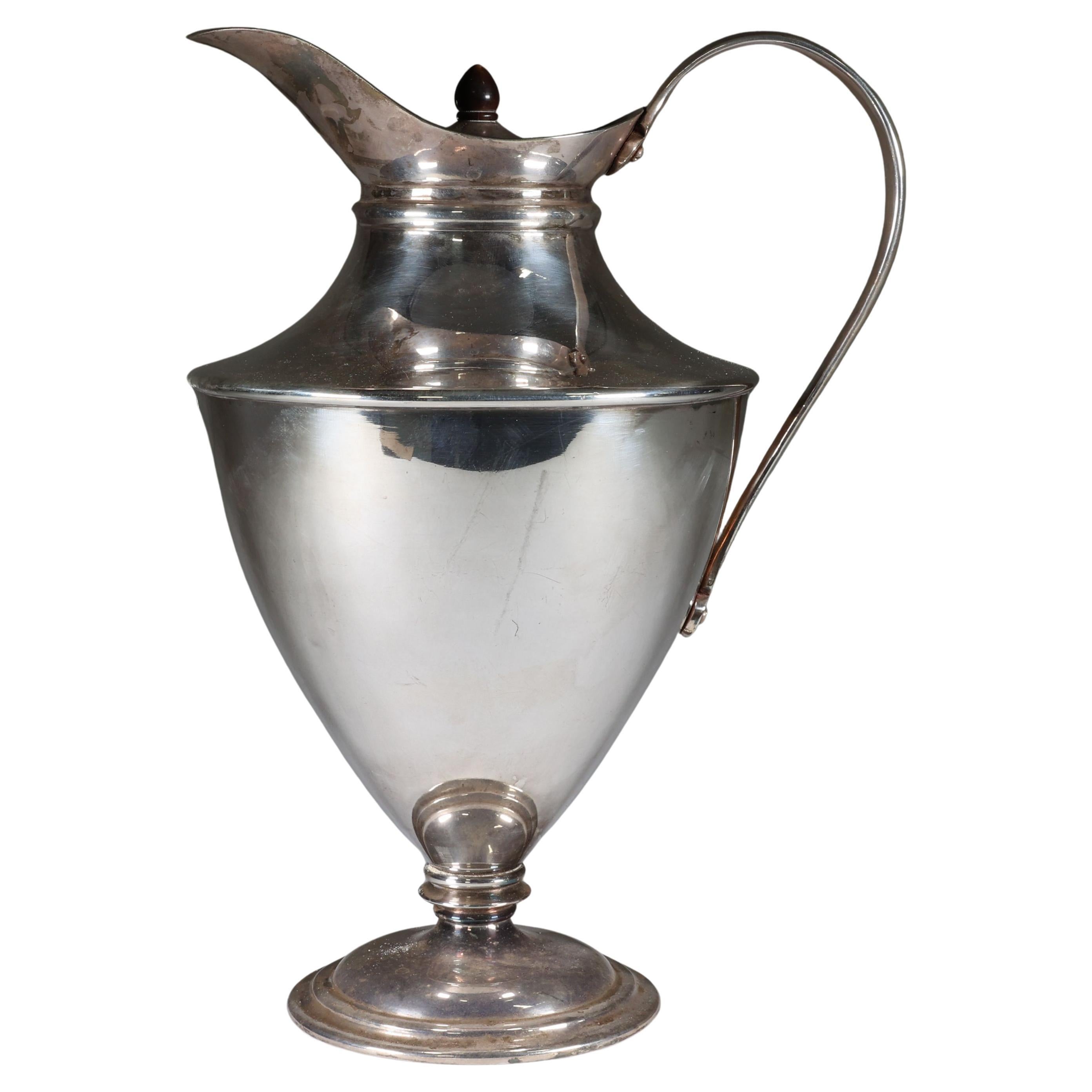 WAS Benson (stamped). A silver plated hot water jug