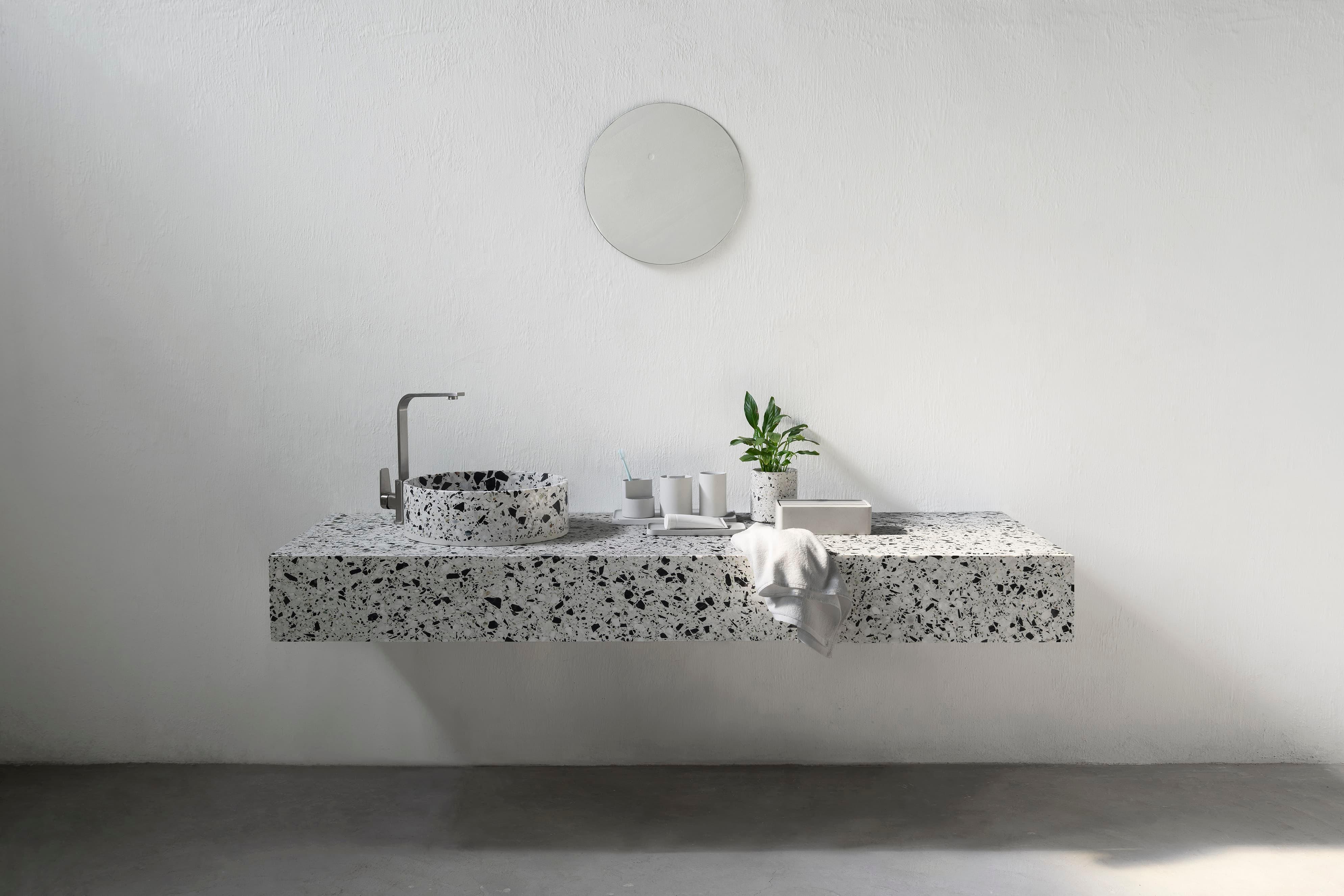 'HUI' is a wash basin / vessel sink made of terrazzo
by Bentu design

Terrazzo colors: White, black, red, sky blue, green mint
Dimensions: H 13 cm, D 40.8 cm

The basin comes with a drainer. 

Bentu design's furniture derives its uniqueness from the