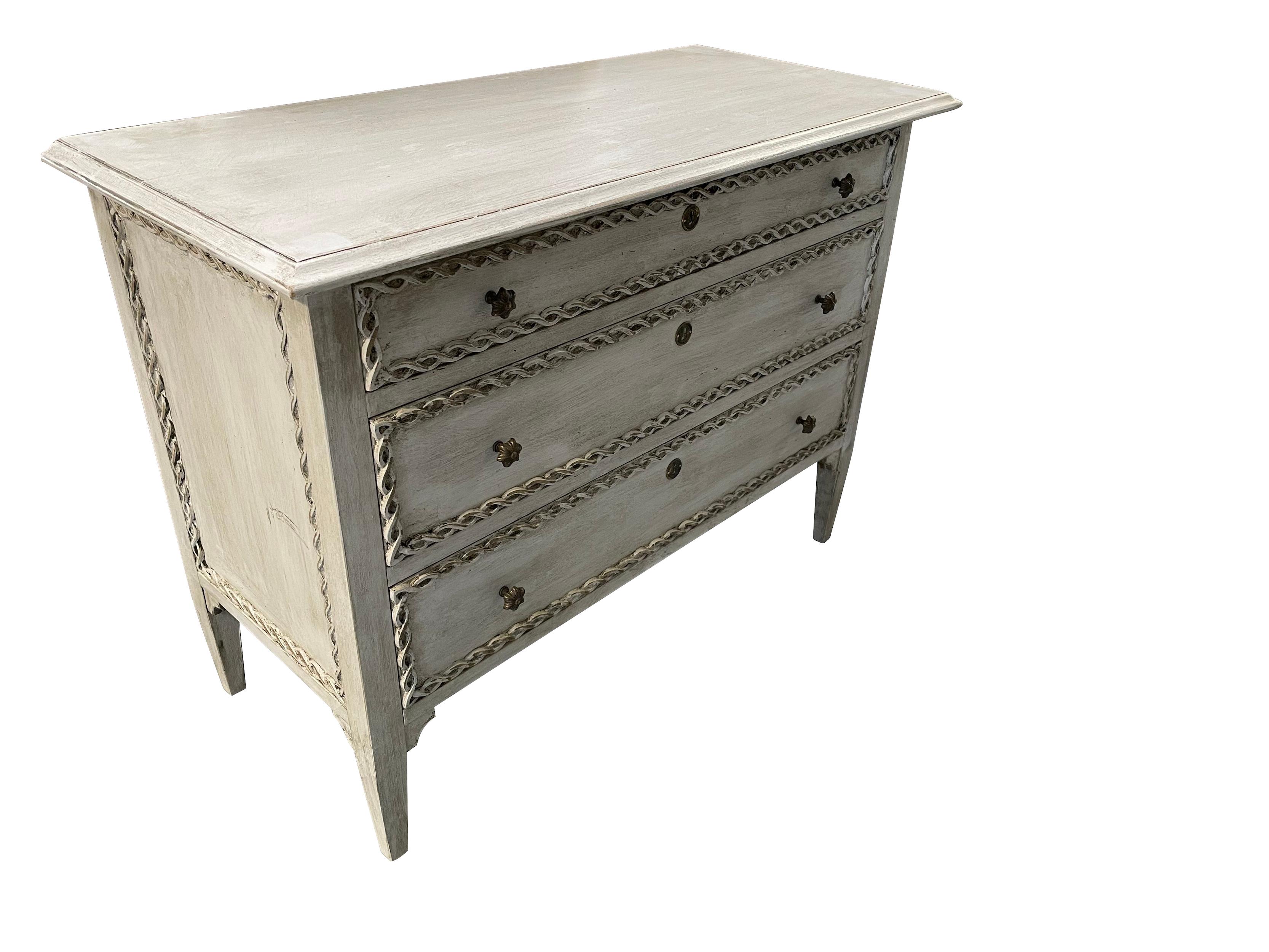 Contemporary Italian three drawer commode.
Decorative washed painted finish.
Carved trellis detailing.
Antique bronze knobs.

