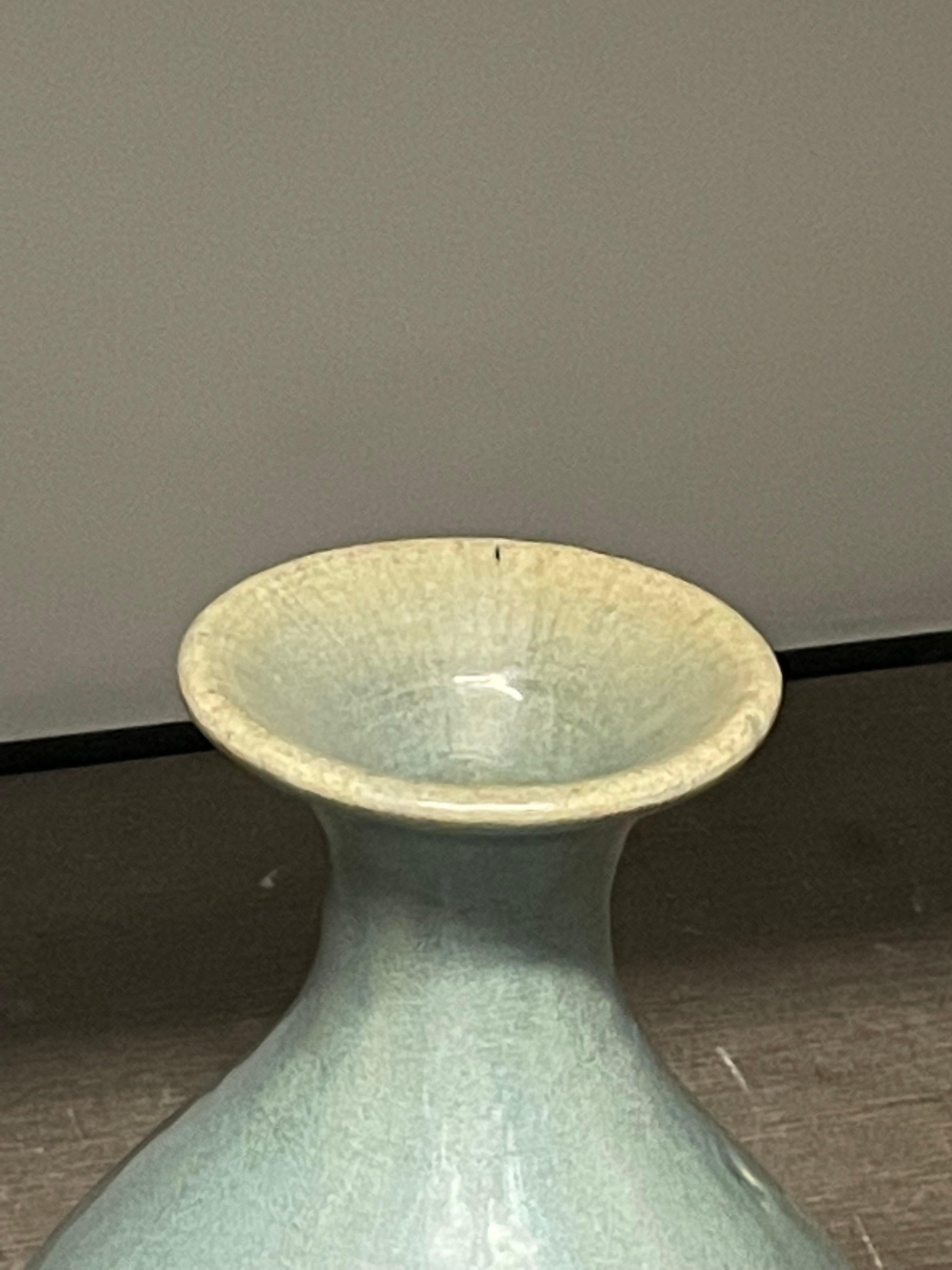 Contemporary Chinese washed turquoise glazed vase.
Tulip shape.
