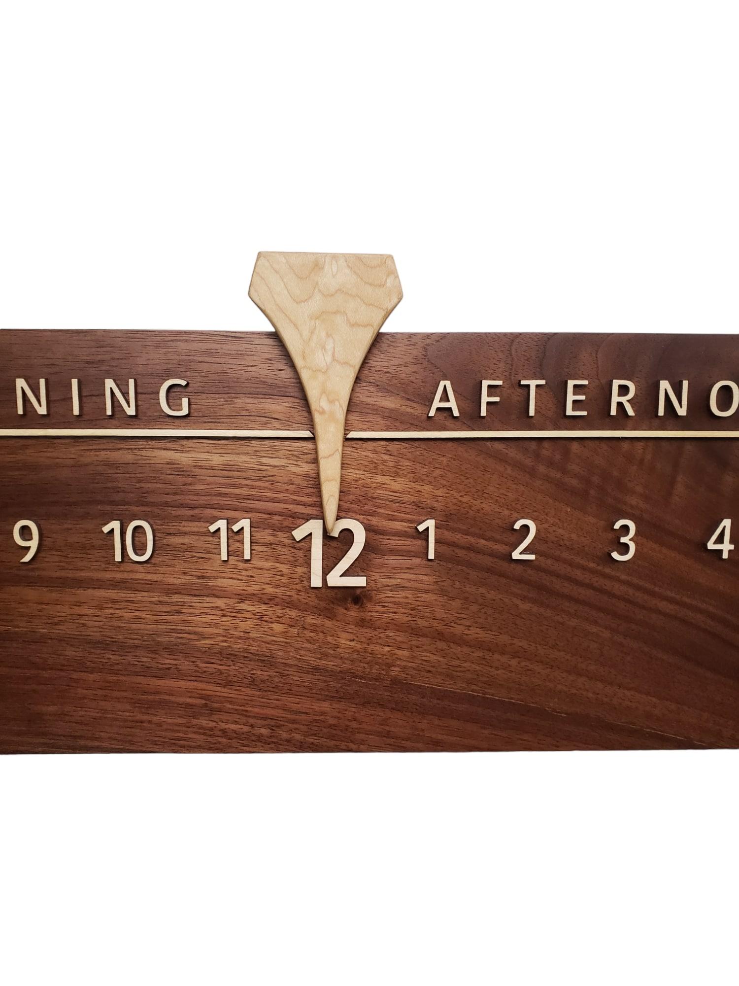 Washington is a Linear Clock featuring an exquisite length of Walnut, with soft purple, golden, and reddish-brown tones that arch in a beautiful rainbow. 

Linear Clocks are an invention of Linear Clockworks; these clocks tell time in a calm,