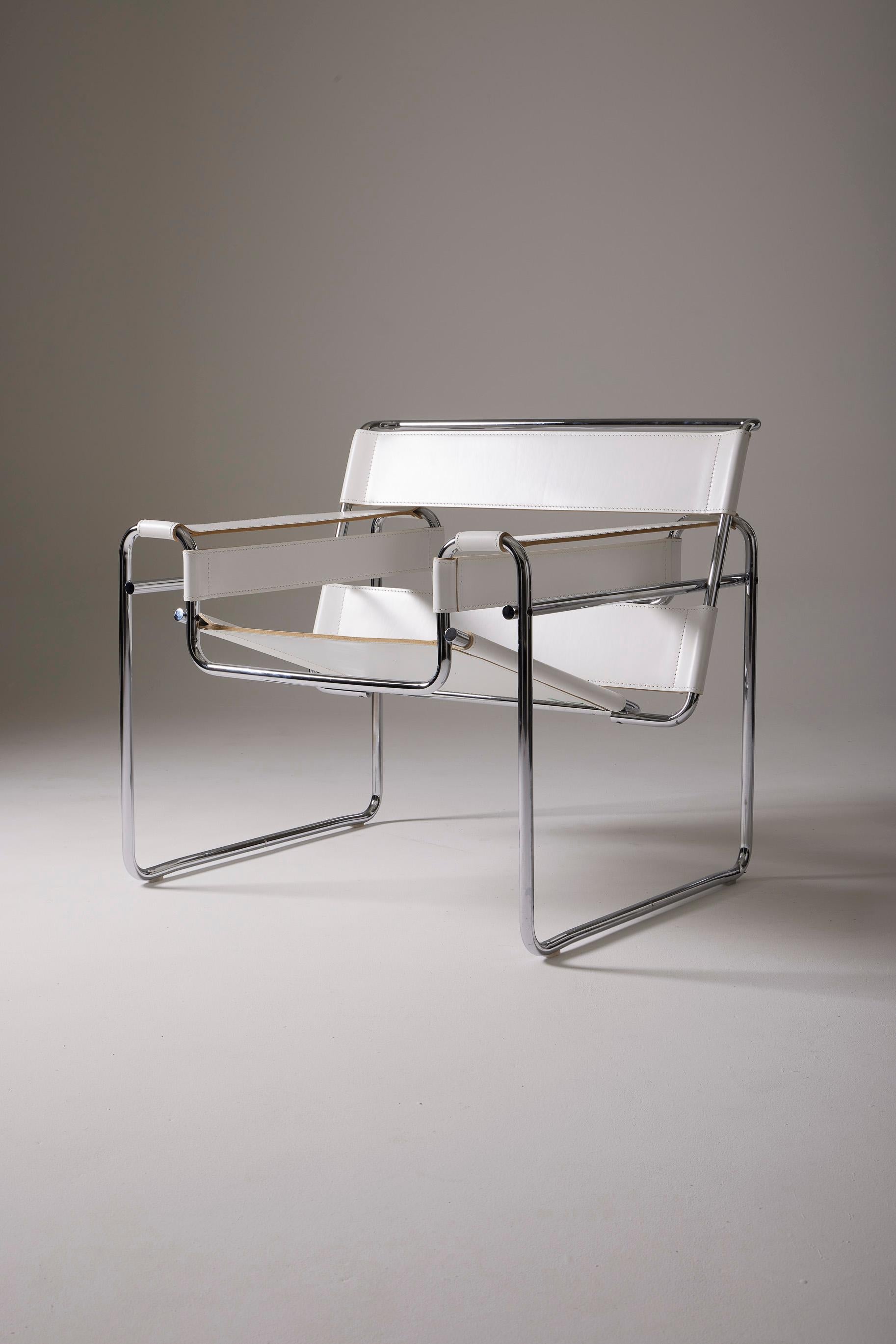 Iconic Wassily chair by designer Marcel Breuer for Knoll. He created this design in 1925 for the apartment of the painter Vassily Kandinsky while he was still a student at the Bauhaus. Its tubular structure, inspired by that of a bicycle, is made of