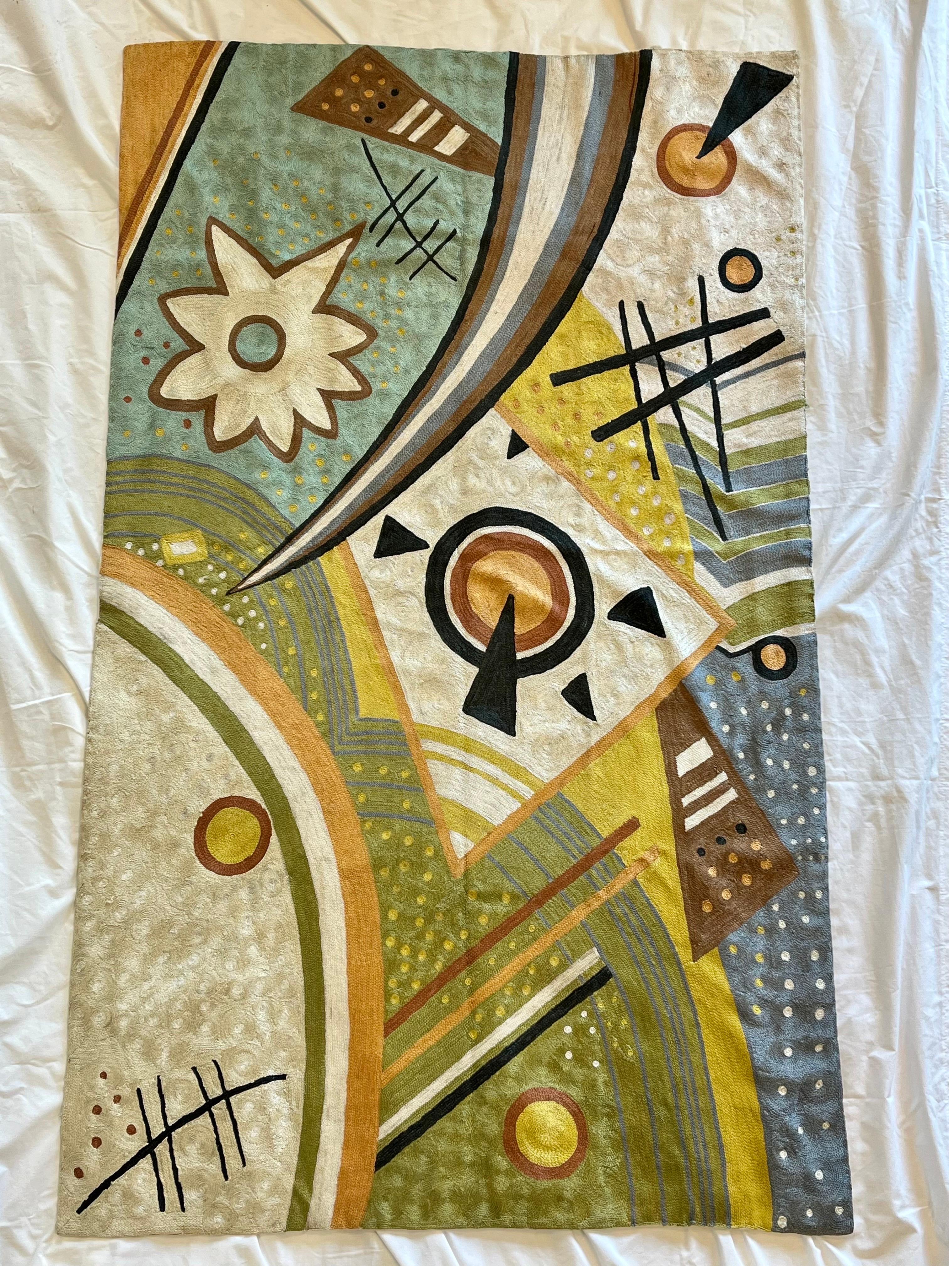 A gorgeous rendition and interpretation of the work of early 20th century Russian avant garde artist Wassily Kandinsky. This contemporary abstract tapestry weaving is hand embroidered using a chain stitch needlepoint method. The design is clearly