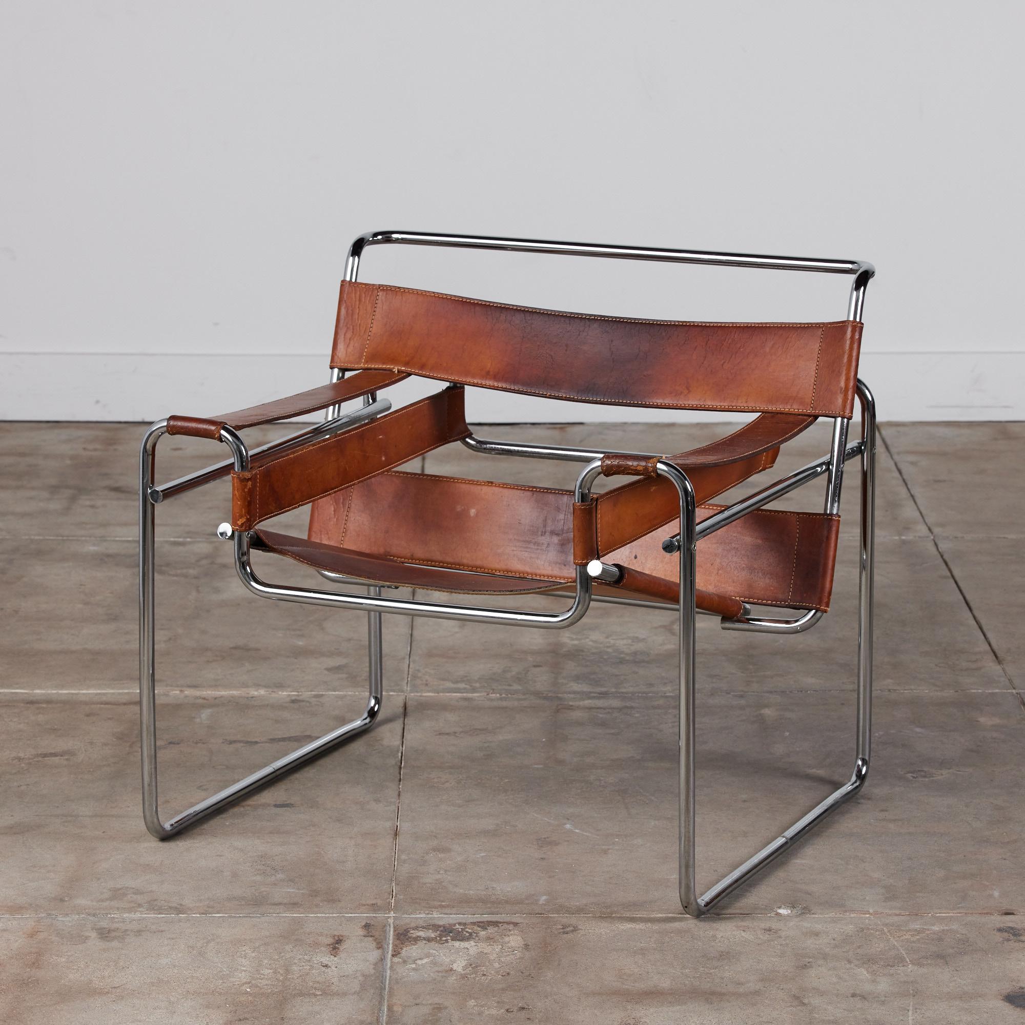 Wassily lounge chair by Marcel Breuer for Knoll International, c.1960s, USA. The model B3 chair showcases a perfectly patinated cognac leather straps on a chrome plated steel tubular frame.

Dimensions: 30.5